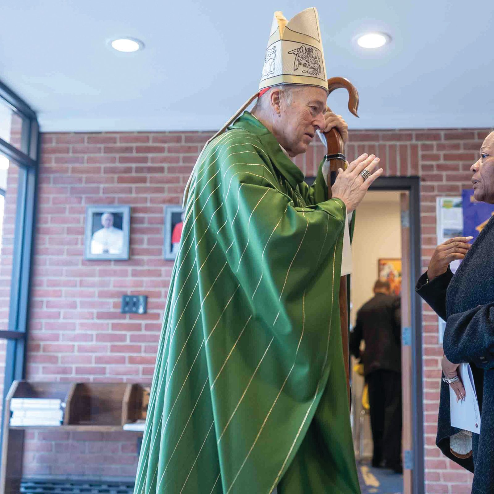 Washington Cardinal Robert W. McElroy greets people after celebrating a Jan. 18 Mass at Shrine of St. Jude Catholic Church in Rockville, Maryland that he offered in remembrance of the legacy of the Rev. Dr. Martin Luther King Jr. (Catholic Standard photo by Mihoko Owada)