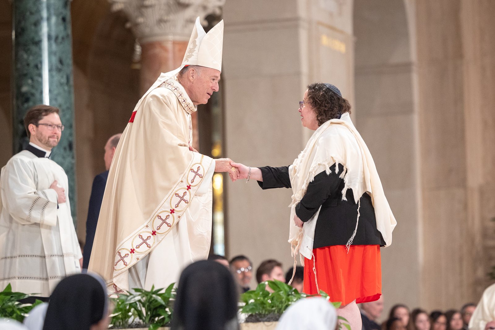 During his Solemn Mass of Installation as the new archbishop of Washington on March 11, 2025 at the Basilica of the National Shrine of the Immaculate Conception, Cardinal Robert McElroy was greeted by religious leaders of other faith communities. (Catholic Standard photo by Mihoko Owada)