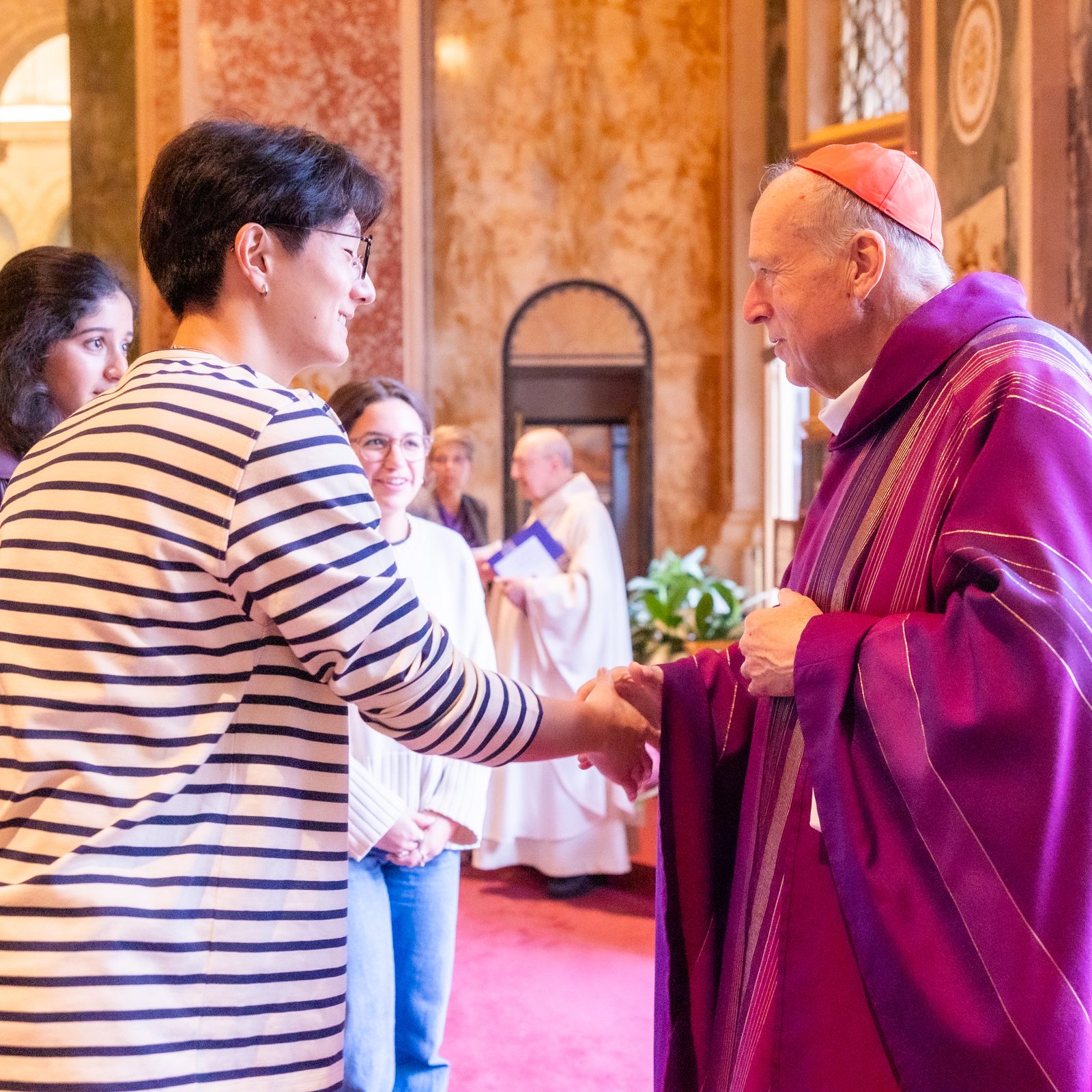 Cardinal Robert W. McElroy greets people after celebrating a Mass on March 16, 2025 at the Cathedral of St. Matthew the Apostle in Washington. (Catholic Standard photos by Mihoko Owada)