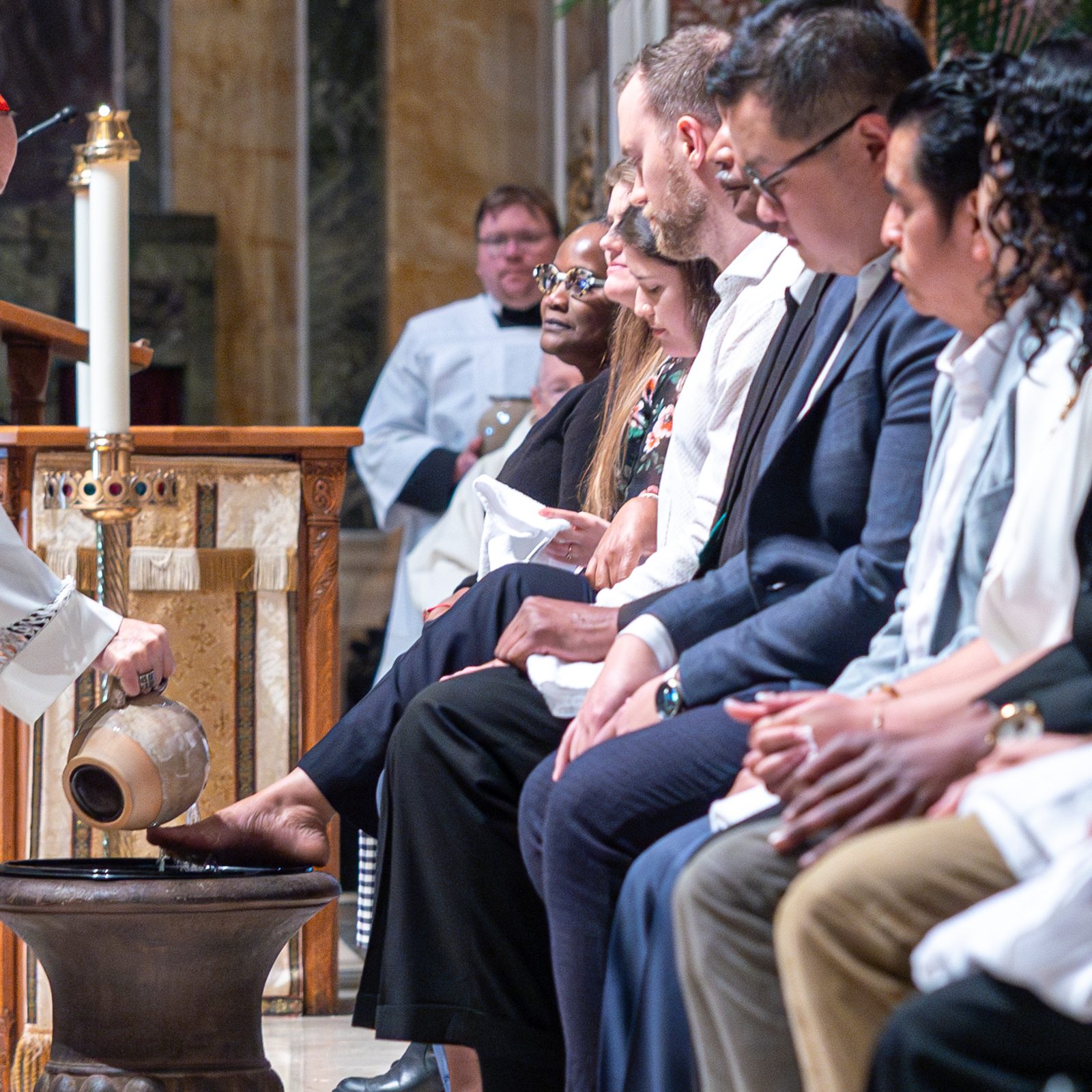 Cardinal Robert W. McElroy washes the feet of a woman during the Holy Thursday Mass of the Lord’s Supper on April 17, 2025 at the Cathedral of St. Matthew the Apostle in Washington, D.C. (Catholic Standard photo by Mihoko Owada)