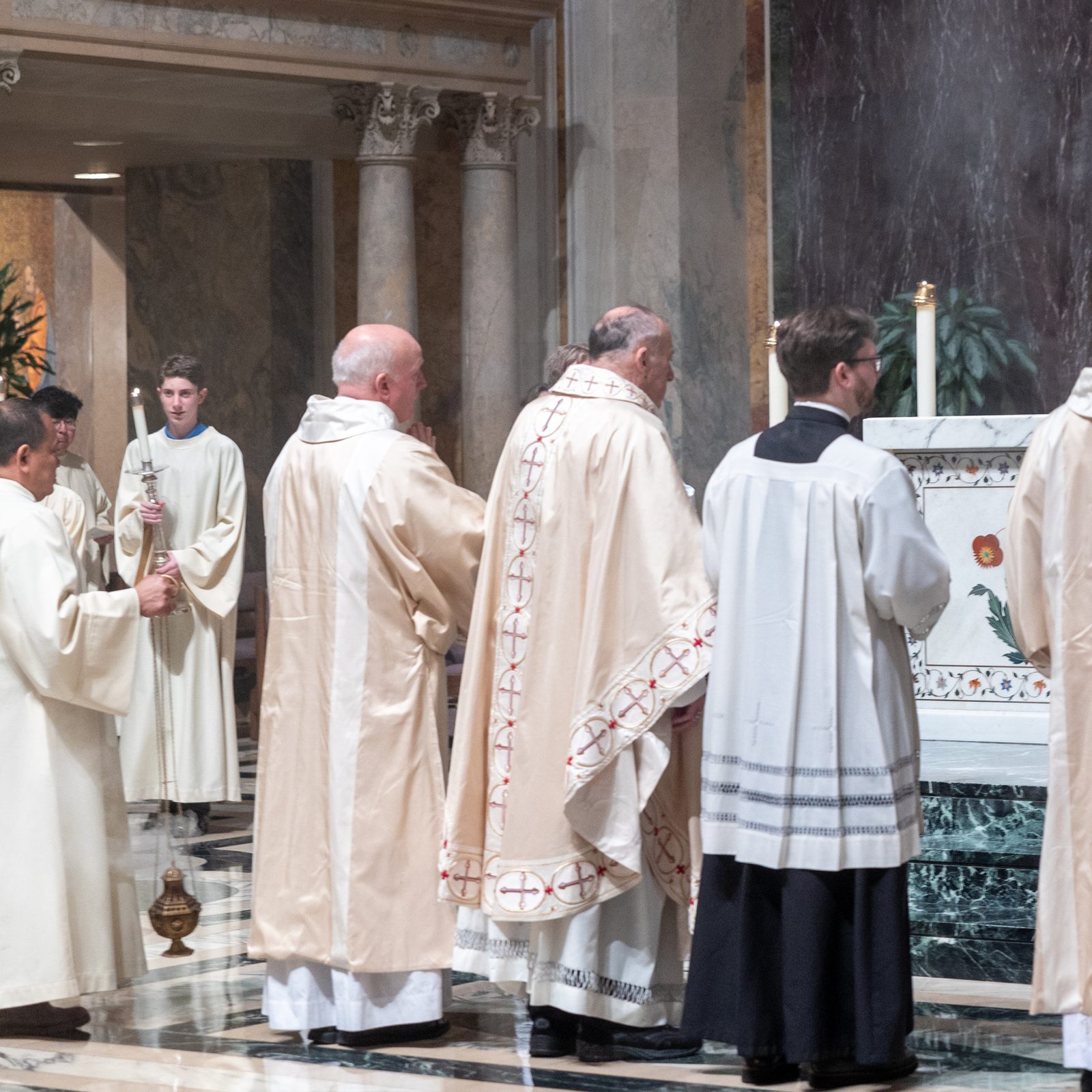 At the end of a Holy Thursday Mass of the Lord’s Supper on April 17, 2025 at the Cathedral of St. Matthew the Apostle in Washington, Father Isaac Sagastume, a parochial vicar at the cathedral, carries the Eucharist from the altar as part of a solemn procession to the St. Anthony Chapel, where people gathered for Adoration of the Most Blessed Sacrament until the cathedral closed later that evening. (Catholic Standard photo by Mihoko Owada)