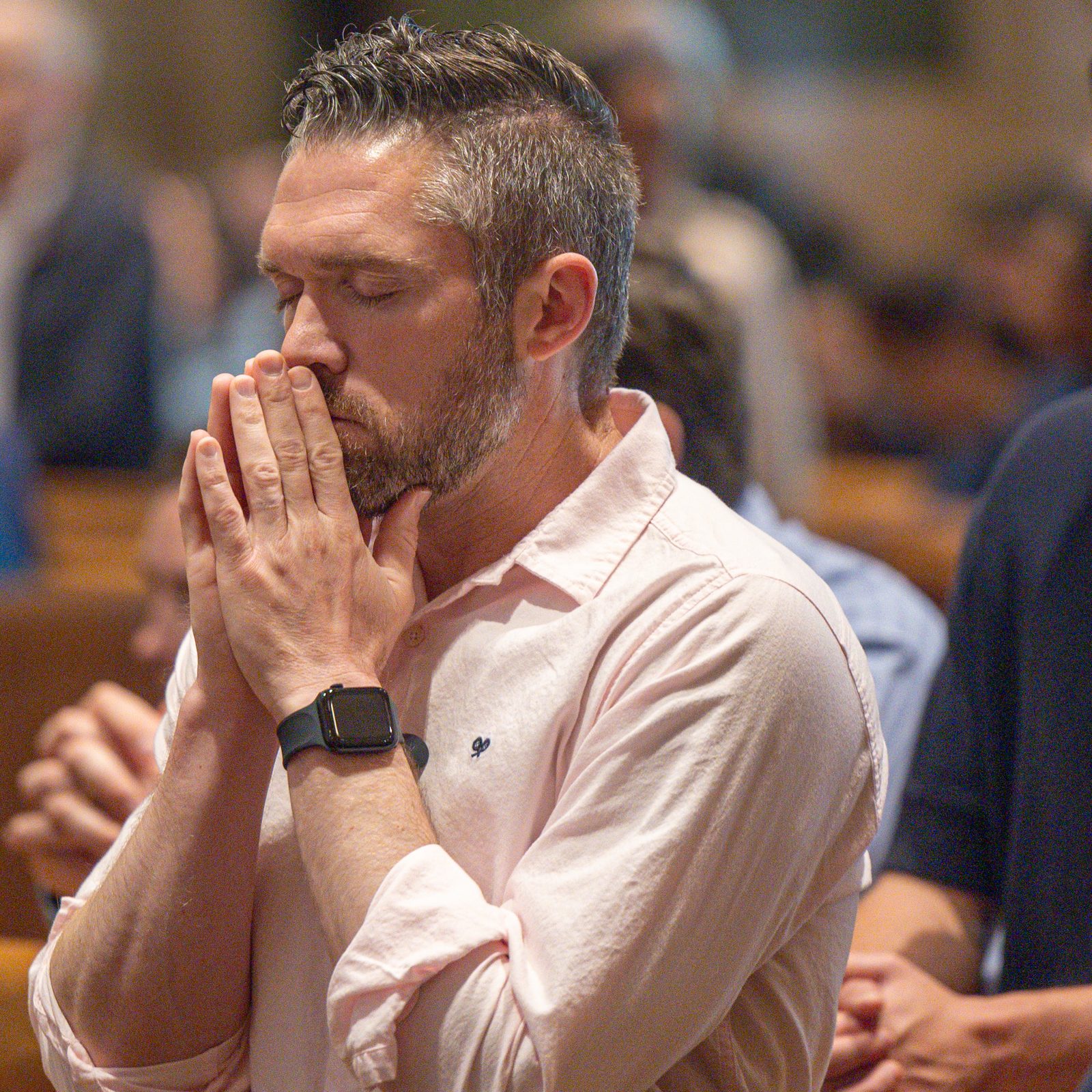 People pray during a Liturgy of the Lord’s Passion held on Good Friday, April 18, 2025, at the Cathedral of St. Matthew the Apostle in Washington. (Catholic Standard photos by Mihoko Owada)