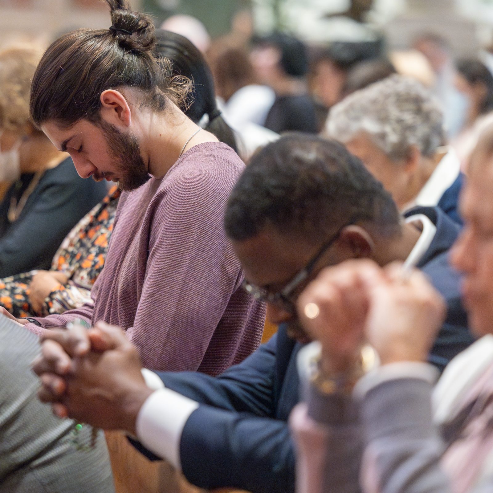 People pray during a Liturgy of the Lord’s Passion held on Good Friday, April 18, 2025, at the Cathedral of St. Matthew the Apostle in Washington. (Catholic Standard photos by Mihoko Owada)