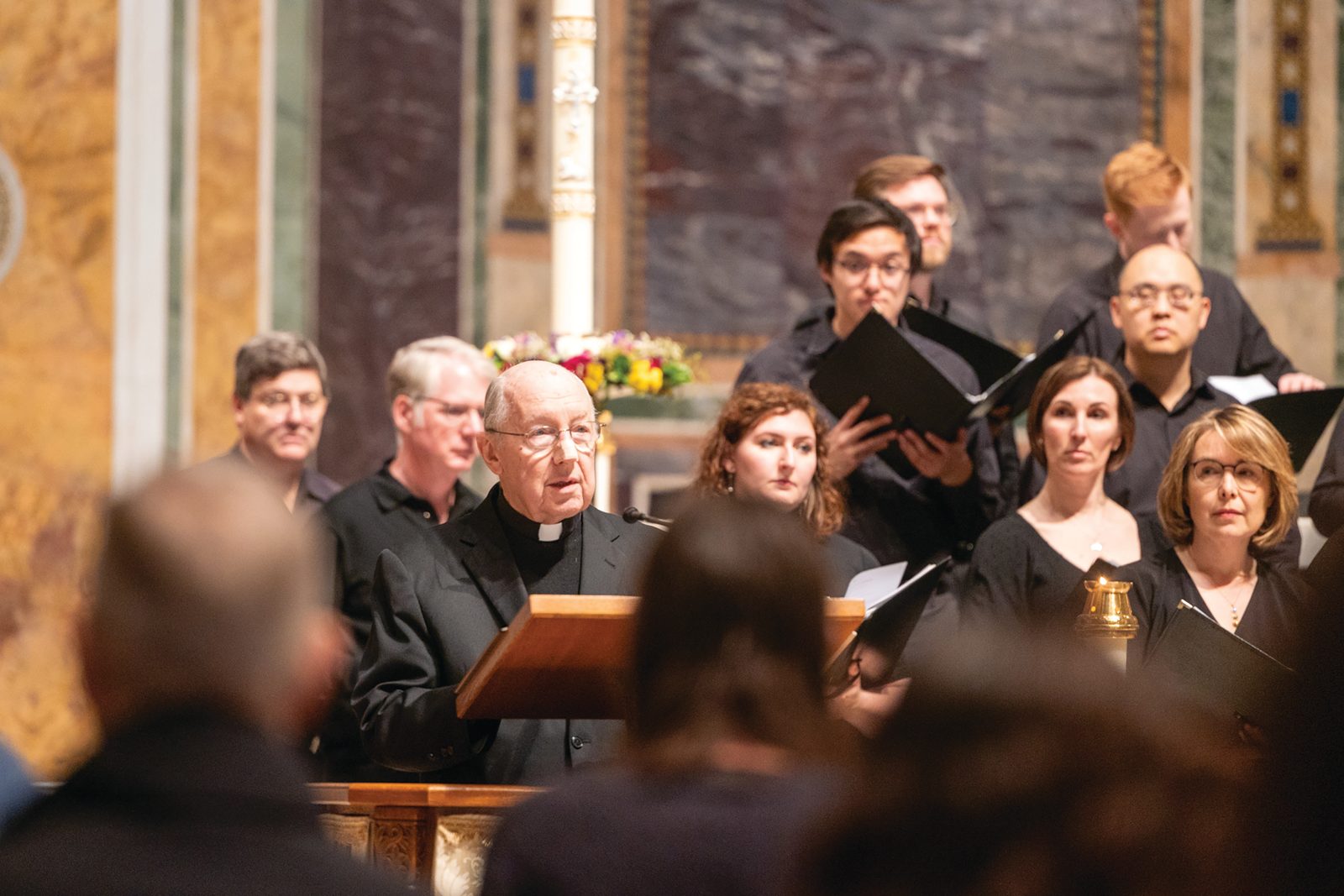 Msgr. W. Ronald Jameson, rector of St. Matthew’s Cathedral, speaks during the “Earth Day Service of Lessons and Carols,” and reminded those in attendance “to marvel at the splendor of creation and to praise and thank the creator whose unconditional love brought the universe to birth.” (Catholic Standard photo by Mihoko Owada)