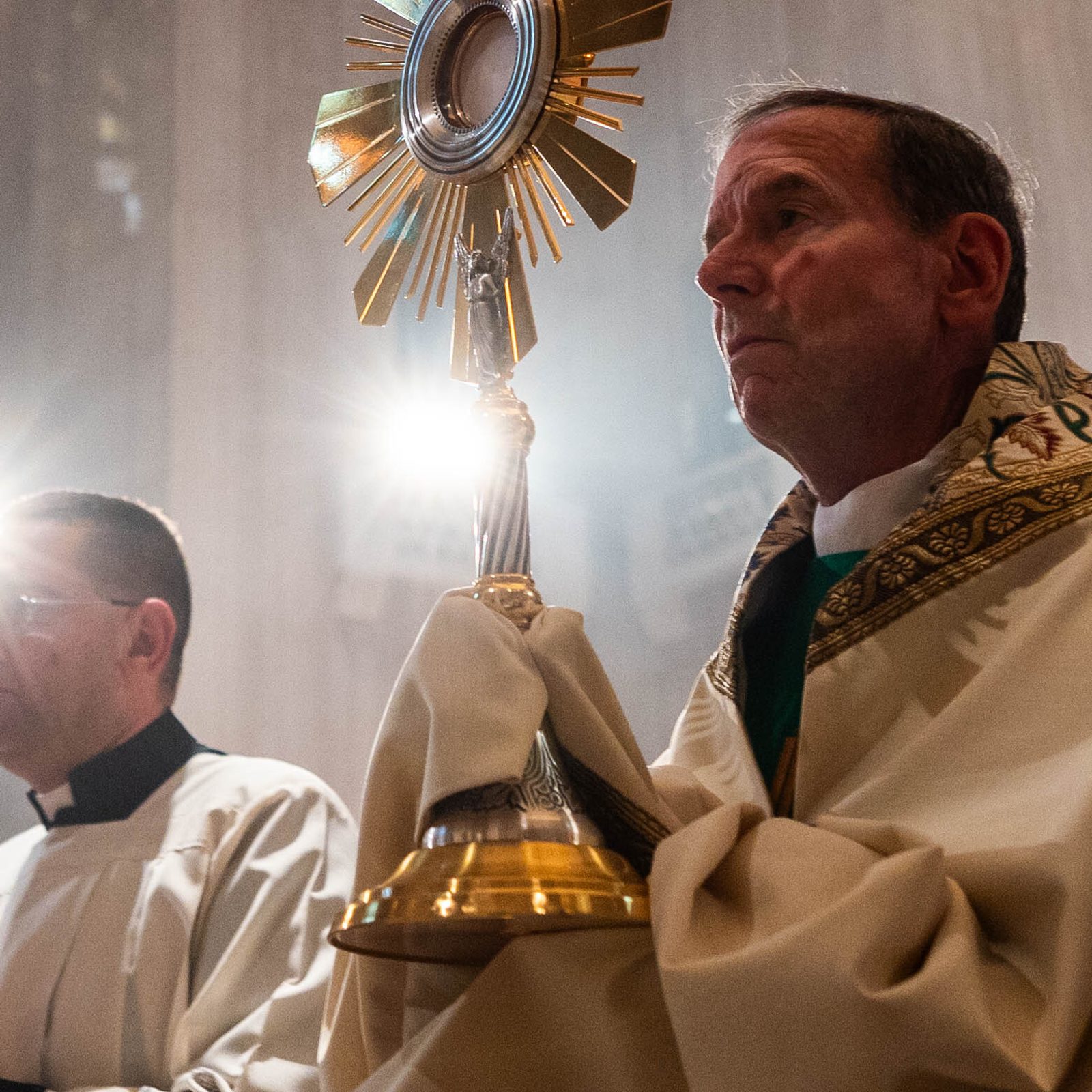 Arlington Bishop Michael F. Burbidge leads a Eucharistic procession through the Basilica of the National Shrine of the Immaculate Conception in Washington, D.C., during the National Eucharistic Pilgrimage Mass on June 9, 2024. (Catholic Standard photo by Mihoko Owada)