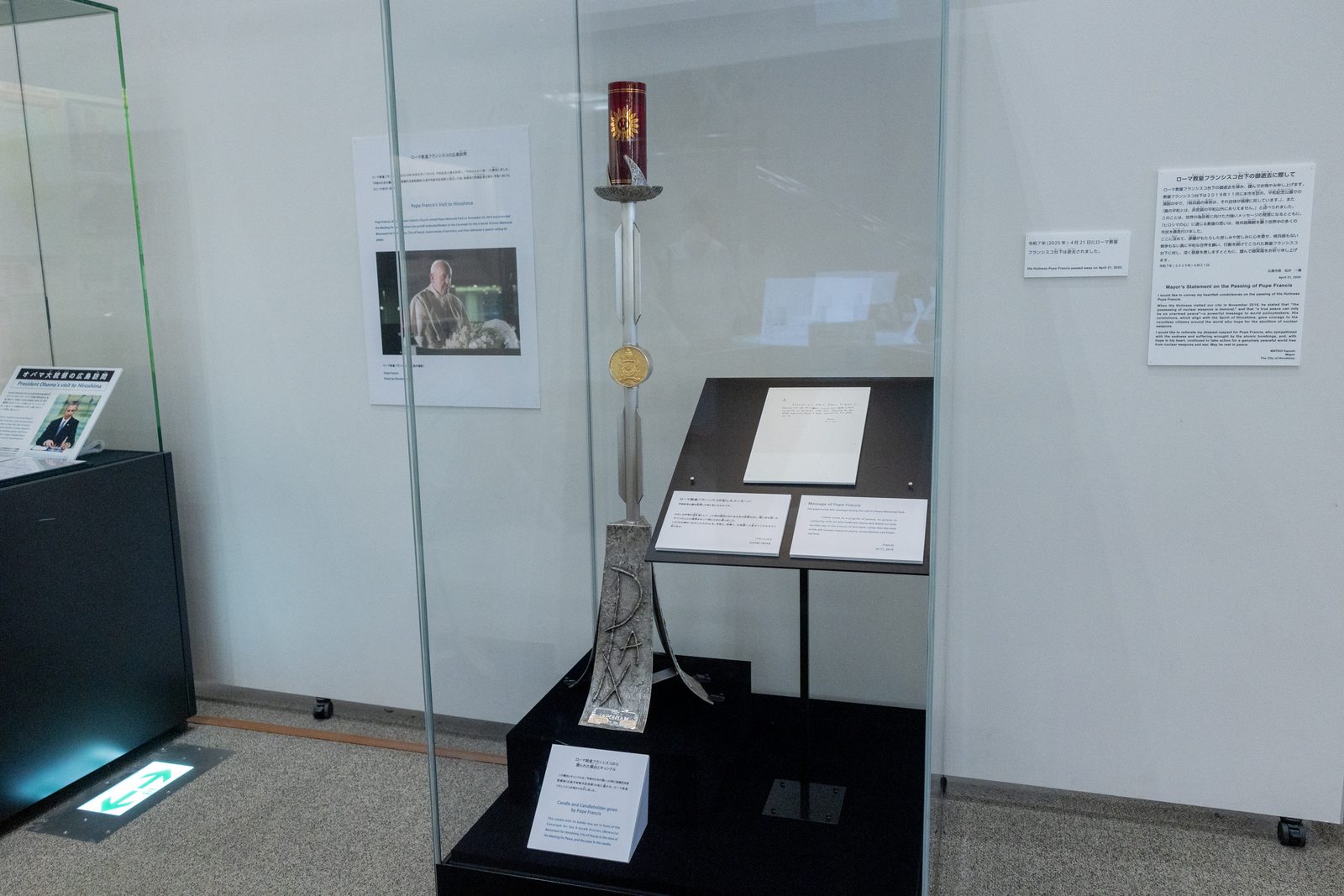 On August 4, a display of the Pope Francis’s message and candleholder given to Hiroshima City is seen at the Hiroshima Peace Memorial Museum. (Catholic Standard photo by Mihoko Owada)
