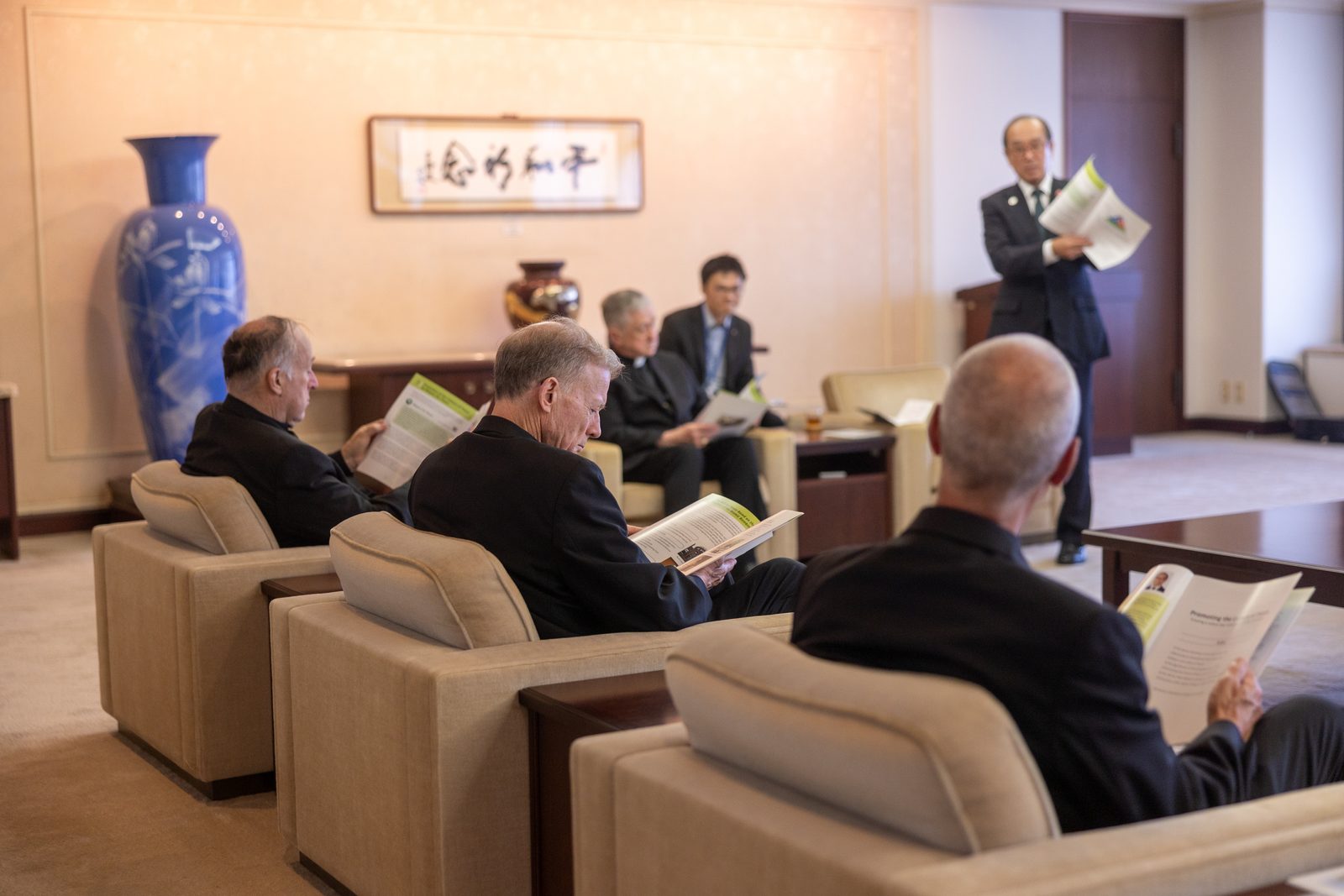 During an August 5 meeting with the mayor of Hiroshima, Kazumi Matsui, the U.S. archbishops and university representatives listen to the mayor's presentation on Hiroshima's initiatives "Promoting a culture of Peace". (Catholic Standard photo by Mihoko Owada)