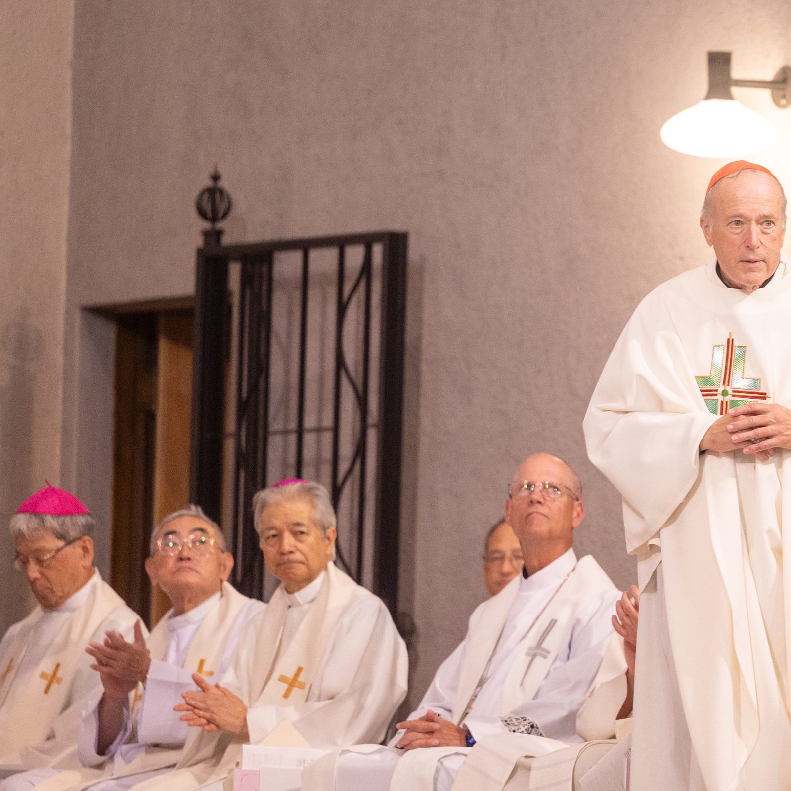 Washington Cardinal Robert W. McElroy is welcomed at a Peace Memorial Mass on Aug. 5, 2025 at the Memorial Cathedral for World Peace in Hiroshima, Japan. The Mass was held on the day before the 80th anniversary of the U.S. atomic bombing of Hiroshima. (Catholic Standard photo by Mihoko Owada)