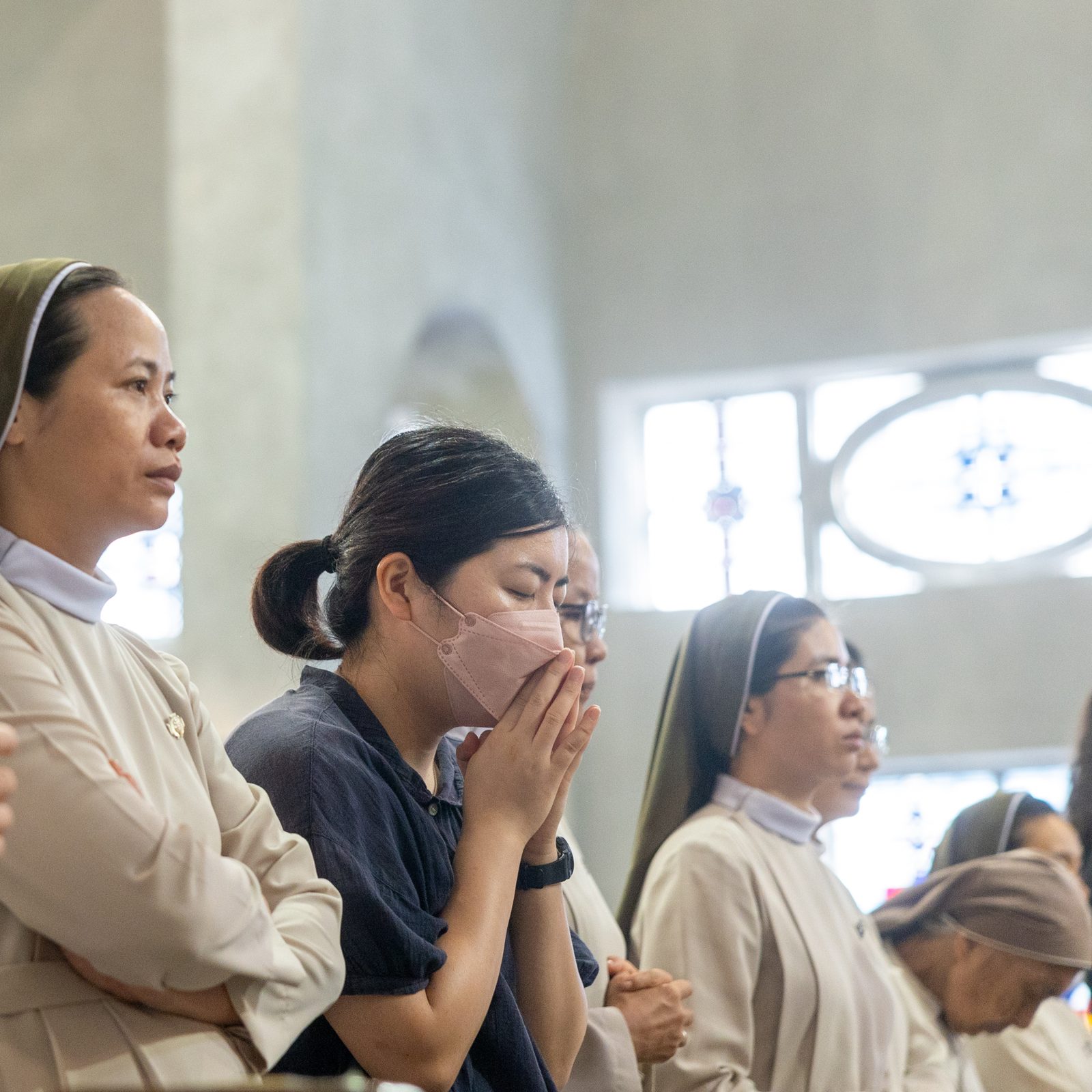 On August 6, 2025 at 8:15 a.m., the moment the United States dropped the first atomic bomb in human history on Hiroshima, Japan, 80 years earlier on Aug. 6, 1945, people observe a moment of silence for the victims of the atomic bombings while sirens sound and church bells ring for one minute during the annual Peace Memorial Mass at the Memorial Cathedral for World Peace in Hiroshima. (Catholic Standard photo by Mihoko Owada)