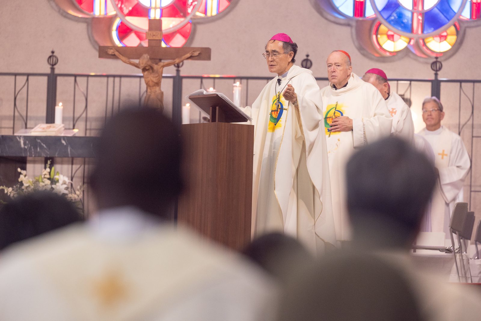 Hiroshima Bishop Alexis Mitsuru Shirahama presides at a Mass on Aug. 6, 2025 at the World Peace Memorial Cathedral in Hiroshima, Japan, for the Victims of the Atomic Bombing. Cardinal Robert W. McElroy of Washington stands behind him. The Mass was part of a Pilgrimage of Peace of four U.S. archbishops and of U.S. Catholic university leaders and students to Hiroshima and Nagasaki to pray and dialogue for peace on the 80th anniversary of when the atomic bombs were dropped on those cities on Aug. 6 and 9, 1945. (Catholic Standard photo by Mihoko Owada)