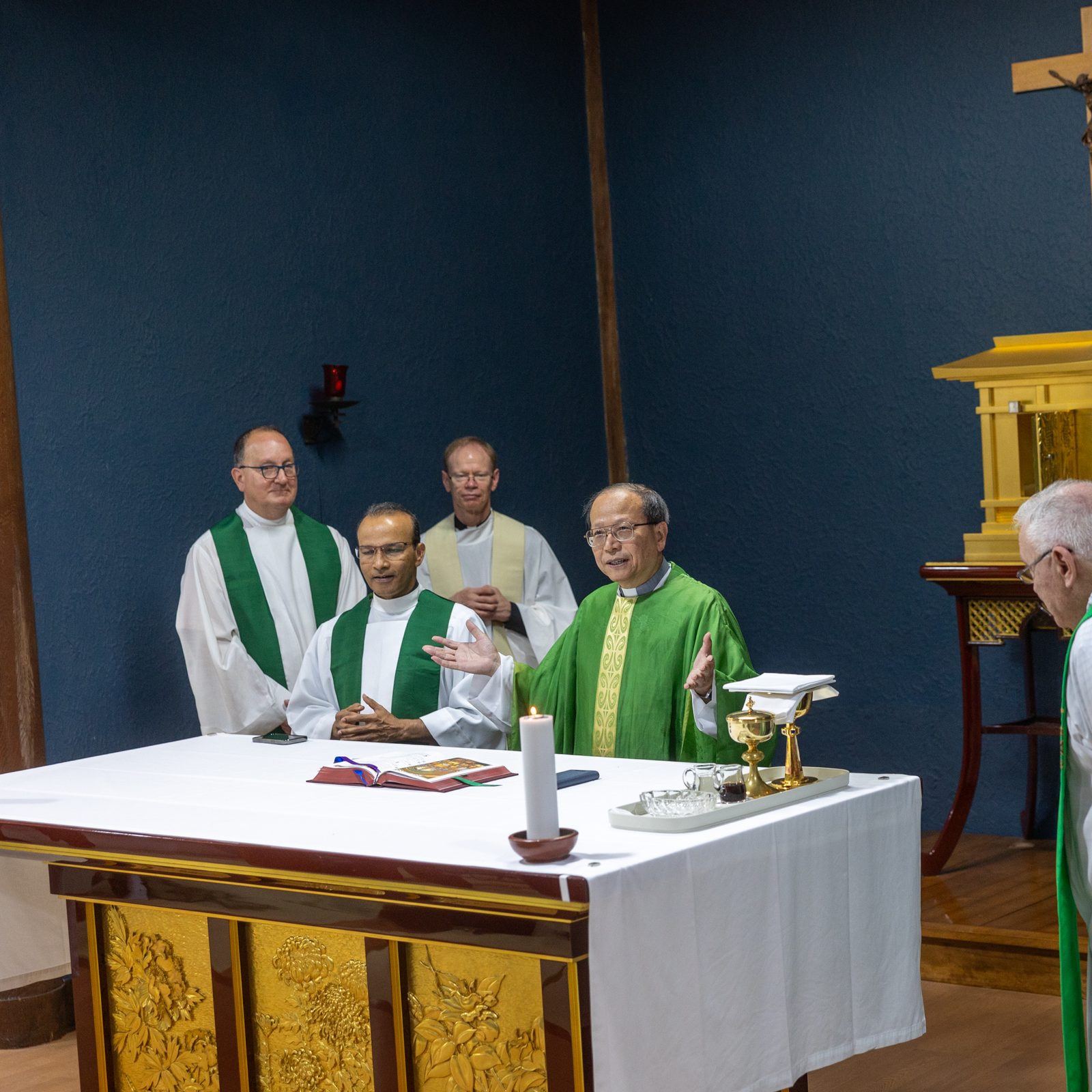 On Aug. 7, 2025, Jesuit Father Tsutomu Sakuma, the provincial of the Jesuits' Japan Province, celebrates Mass in the chapel of the former Jesuit novitiate in Nagatsuka, a suburb of Hiroshima, with other priests, including (from left) Jesuit Father Mark Bosco, the vice president for Mission and Ministry at Georgetown University; Jesuit Father Sali Augustine, the chancellor of the Sophia School Corporation of Sophia University in Tokyo; and Holy Cross  Father Robert Dowd, the president of the University of Notre Dame. (Catholic Standard photo by Mihoko Owada)