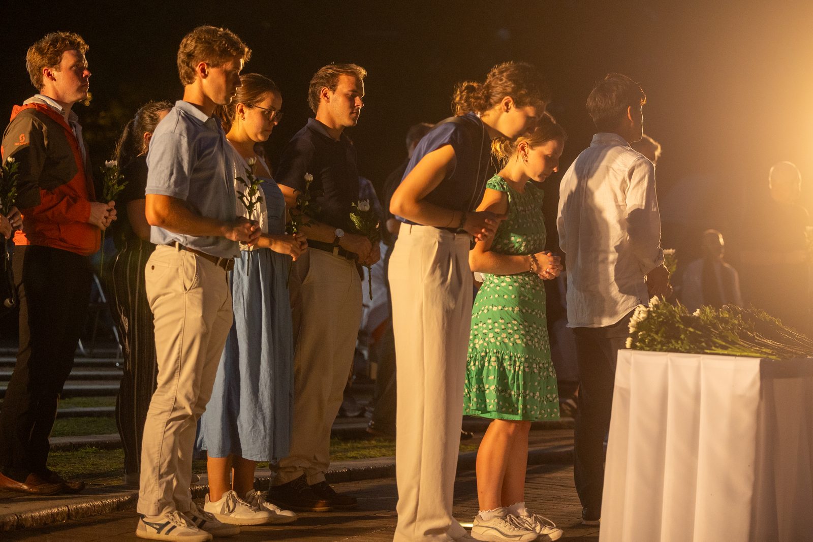 During the 53rd Memorial Service for the Victims of the Atomic Bombing on Aug. 8, 2025 at Nagasaki Hypocenter Park, participants including university students from the United States offer flowers to pray for the atomic bombing victims. The Nagasaki Hypocenter Park is located at ground zero of the U.S. atomic bombing of Nagasaki on Aug. 9, 1945. (Catholic Standard photo by Mihoko Owada)