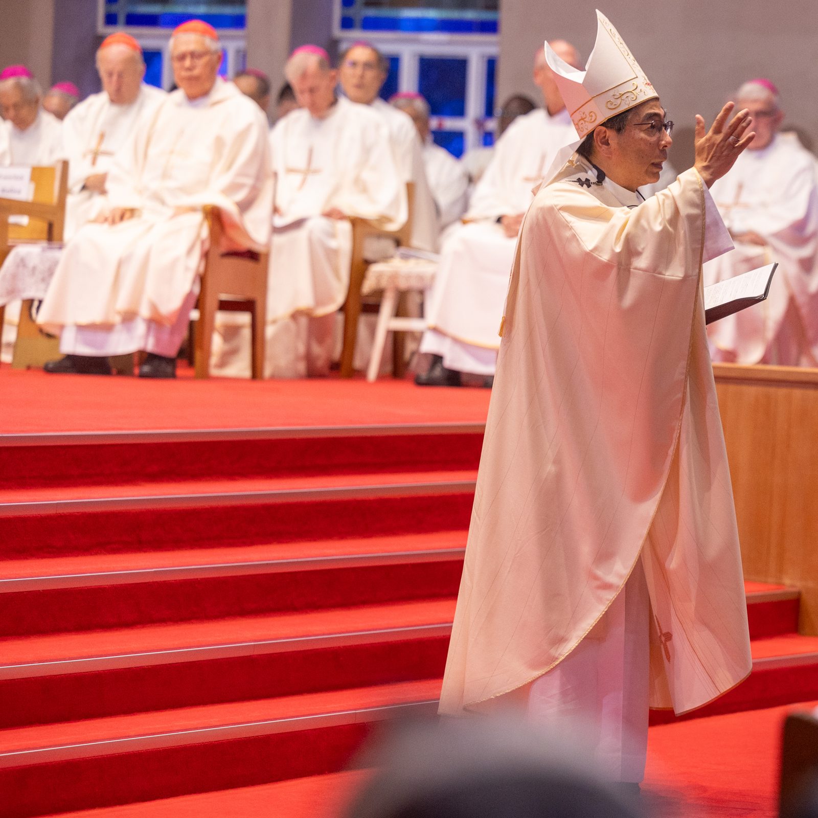 Archbishop Peter Michiaki Nakamura of Nagasaki, Japan, gives the homily at a Peace Memorial Mass at Urakami Cathedral in Nagasaki on Aug. 9, 2025, on the day of the 8oth anniversary of the U.S. atomic bombing of that city. The concelebrants in the background include four archbishops from the United States who joined a Pilgrimage of Peace along with U.S. Catholic university and students to commemorate the anniversary and to pray and dialogue for peace and a world without nuclear weapons. (Catholic Standard photo by Mihoko Owada)