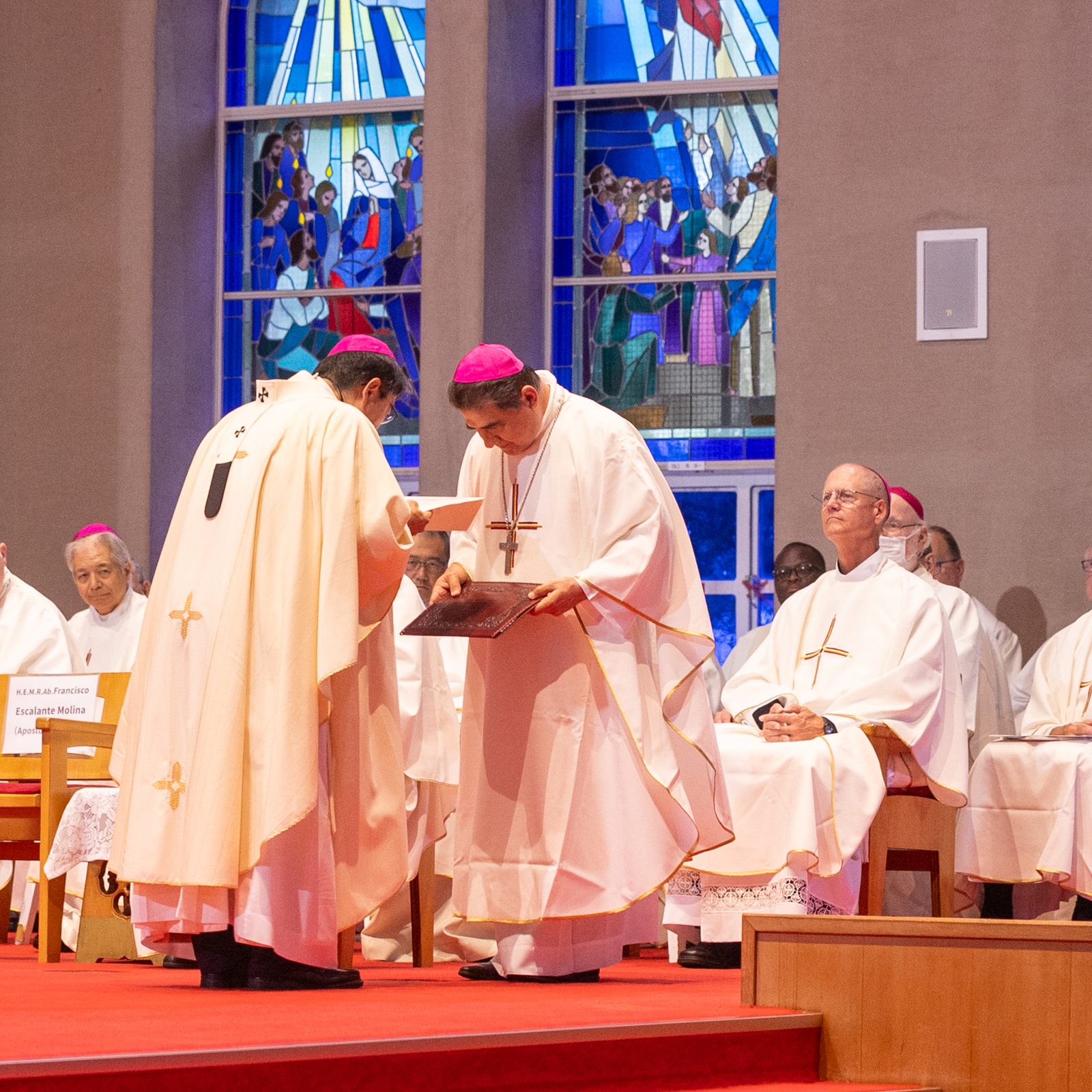 Archbishop Francisco Escalante Molina, the Vatican’s apostolic nuncio to Japan, delivered a message from Pope Leo XIV to Archbishop Peter Michiaki Nakamura of Nagasaki at the beginning of the 6 p.m. Peace Memorial Mass at Urakami Cathedral in Nagasaki on Aug. 9, 2025, the 80th anniversary of the atomic bombing of that city. Approximately 1,200 people gathered, including about 50 participants in a Pilgrimage of Peace from the United States. Some participants joined from the parish hall venue, where the Mass was livestreamed. (Catholic Standard photo by Mihoko Owada)