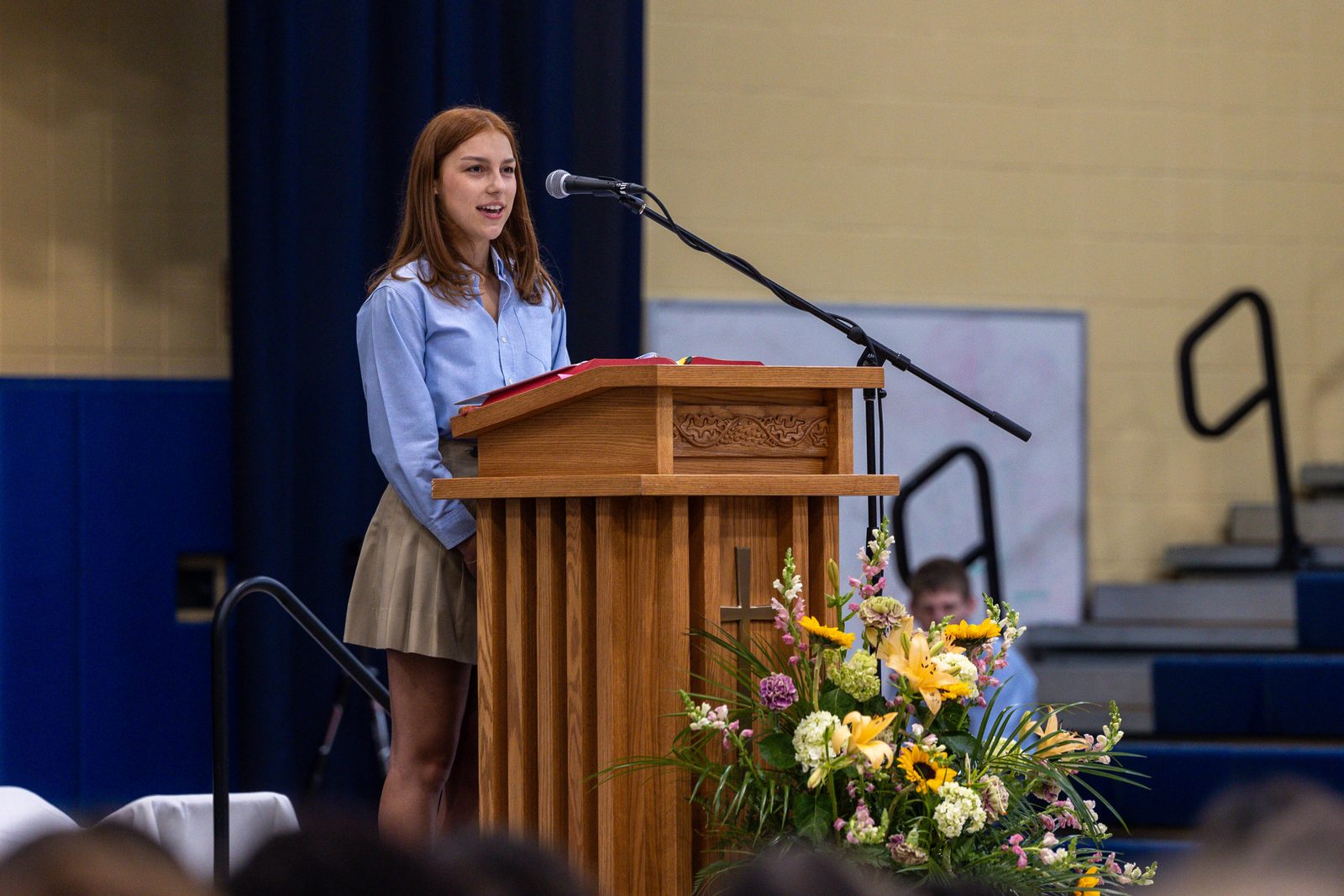 Izzy Magyar, a senior in the class of 2025 at Our Lady of Good Counsel High School in Olney, offers remarks before the opening school year Mass there on Aug. 29, 2024. (Catholic Standard photo by Mihoko Owada)