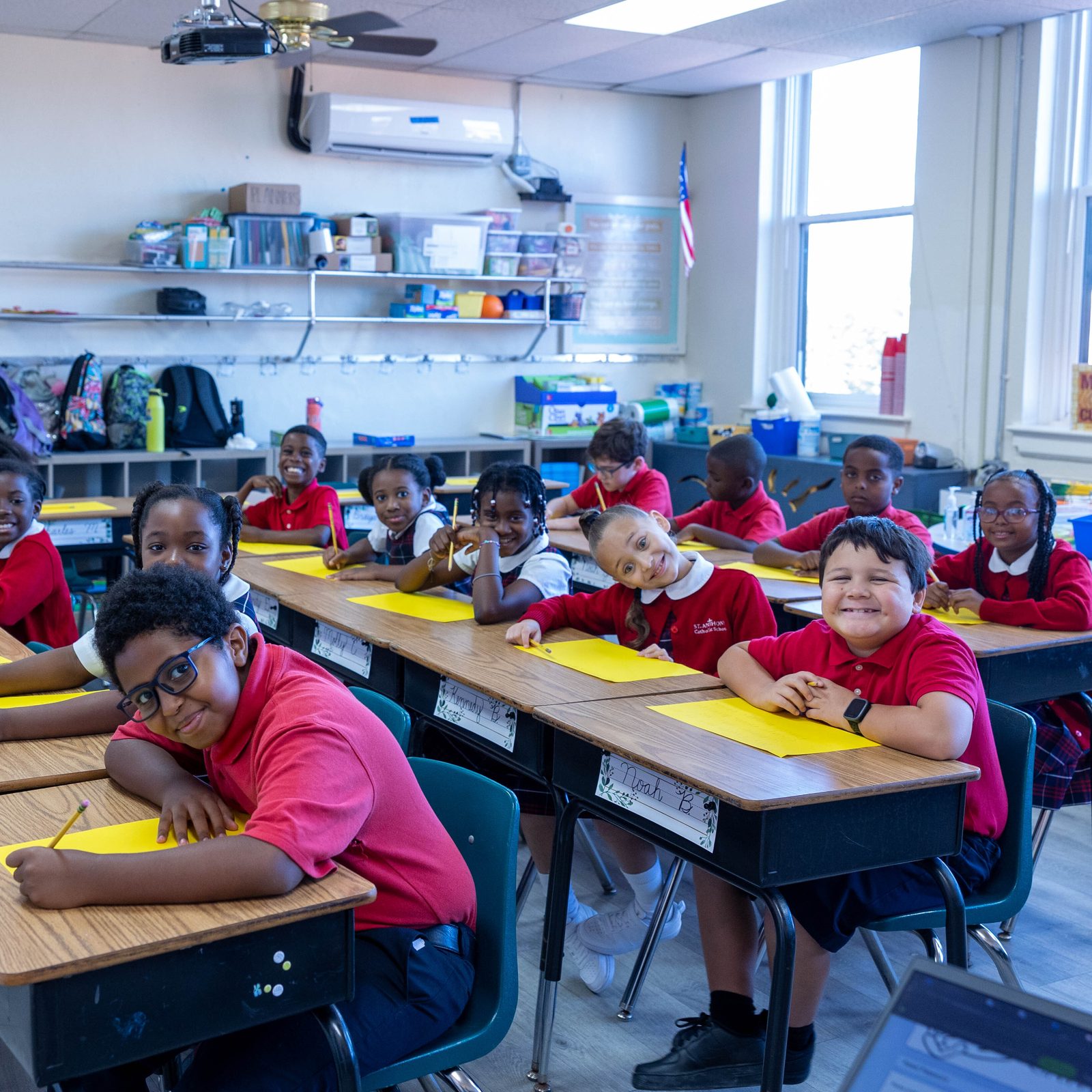 Sister Maria Lucia, a member of the Dominican Sisters of St. Cecilia of Nashville, Tennessee, poses for a photo with her third grade class at St. Anthony Catholic School in Washington, D.C., on the first day of school there on Sept. 3, 2024. (Catholic Standard photo by Mihoko Owada)