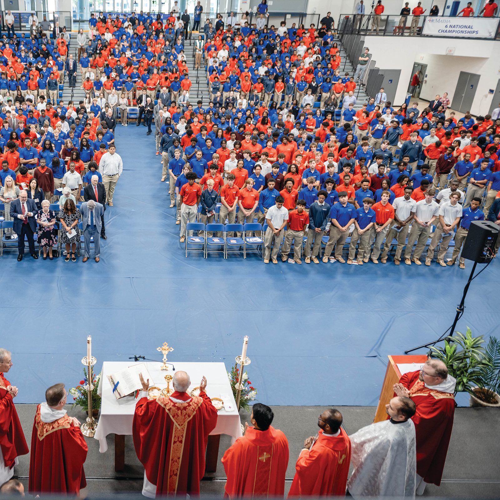 Students and staff at DeMatha Catholic High School in Hyattsville, Maryland gather Sept. 9 in the school’s Lt. (Seal) Brendan Looney '99 Convocation Center for a Mass celebrated by Archbishop Gabriele Caccia, the apostolic nuncio to the United States, to open the academic year at the Trinitarian-sponsored school. (DeMatha photo by Andrew Travers)