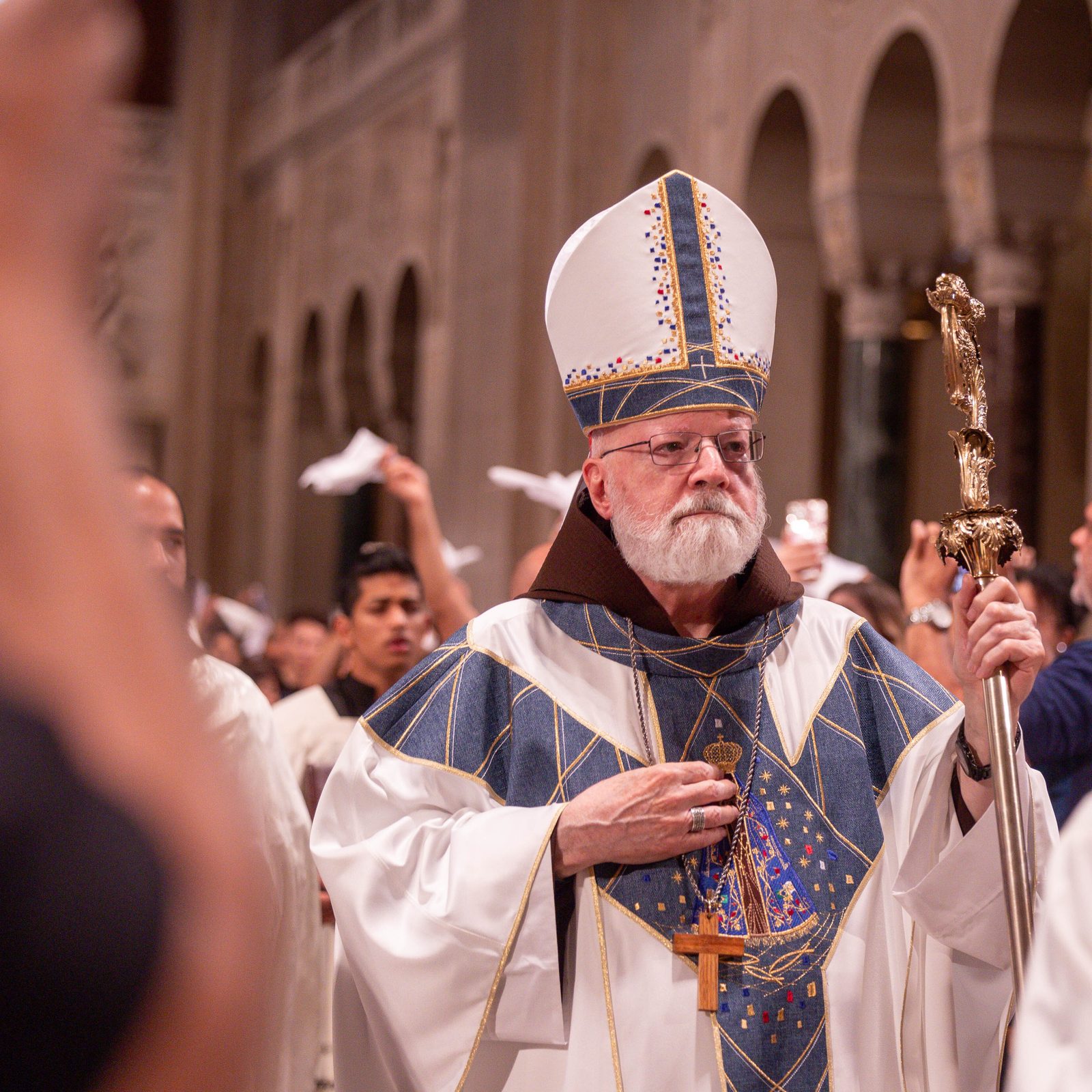 Boston Cardinal Sean O'Malley, the main celebrant at the Sept. 14 dedication Mass at the National Shrine for the new Oratory of Our Lady of Aparecida, processes to the altar as the Mass begins. (Catholic Standard photo by Mihoko Owada)