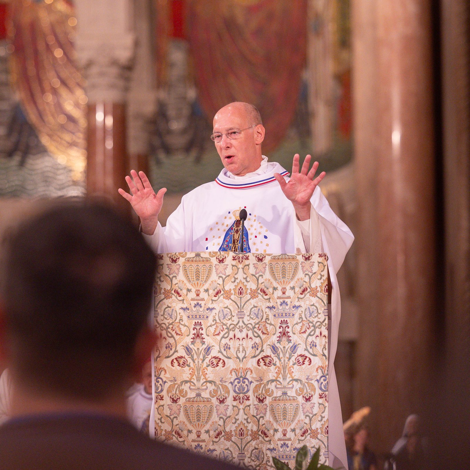 Msgr. Walter Rossi, the National Shrine's rector, speaks at the beginning of the Sept. 14 dedication Mass for the new Oratory of Our Lady of Aparecida there. (Catholic Standard photo by Mihoko Owada)