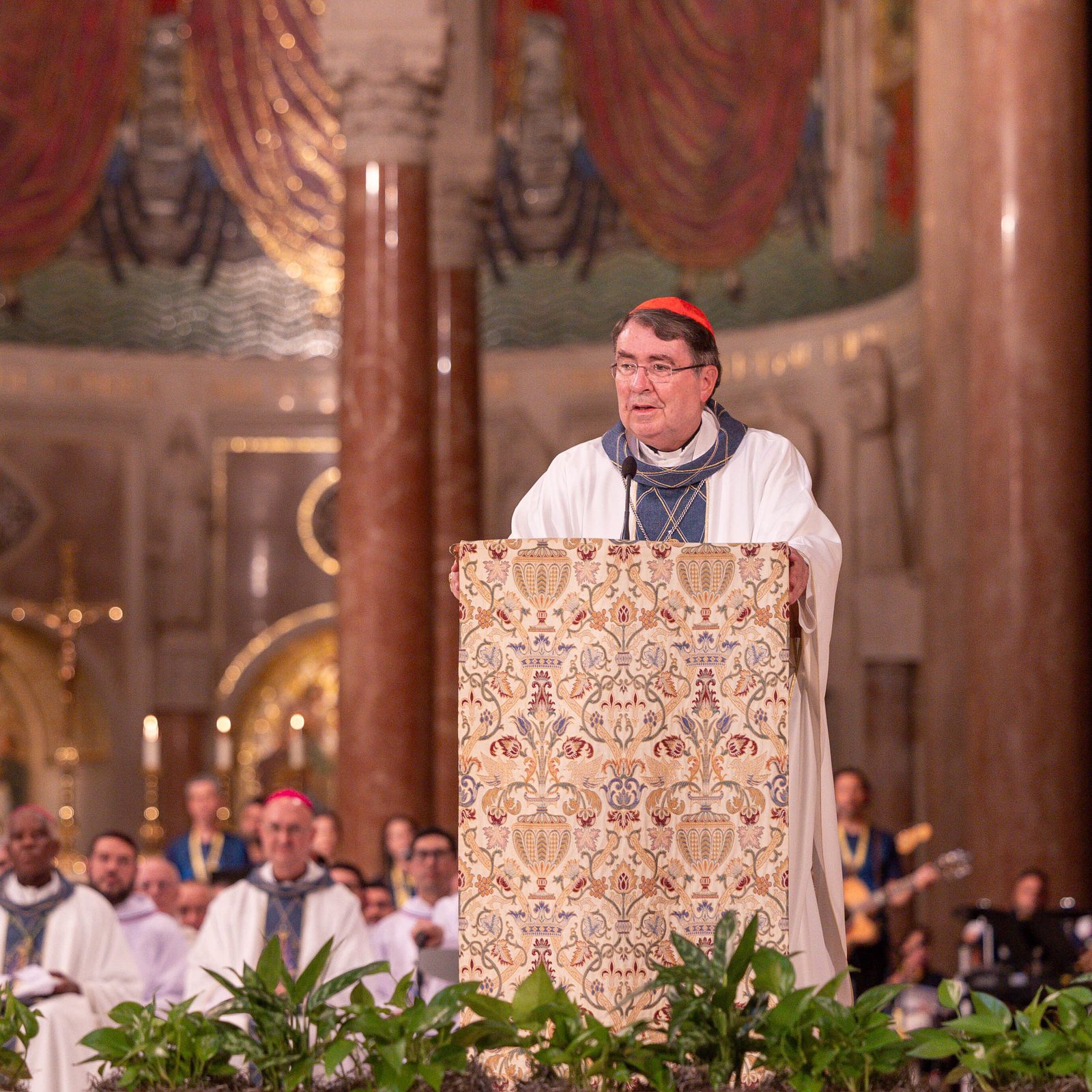 Cardinal Christophe Pierre, the apostolic nuncio to the United States, speaks at the Sept. 14 dedication Mass for the National Shrine's new Oratory of Our Lady of Aparecida. (Catholic Standard photo by Mihoko Owada)