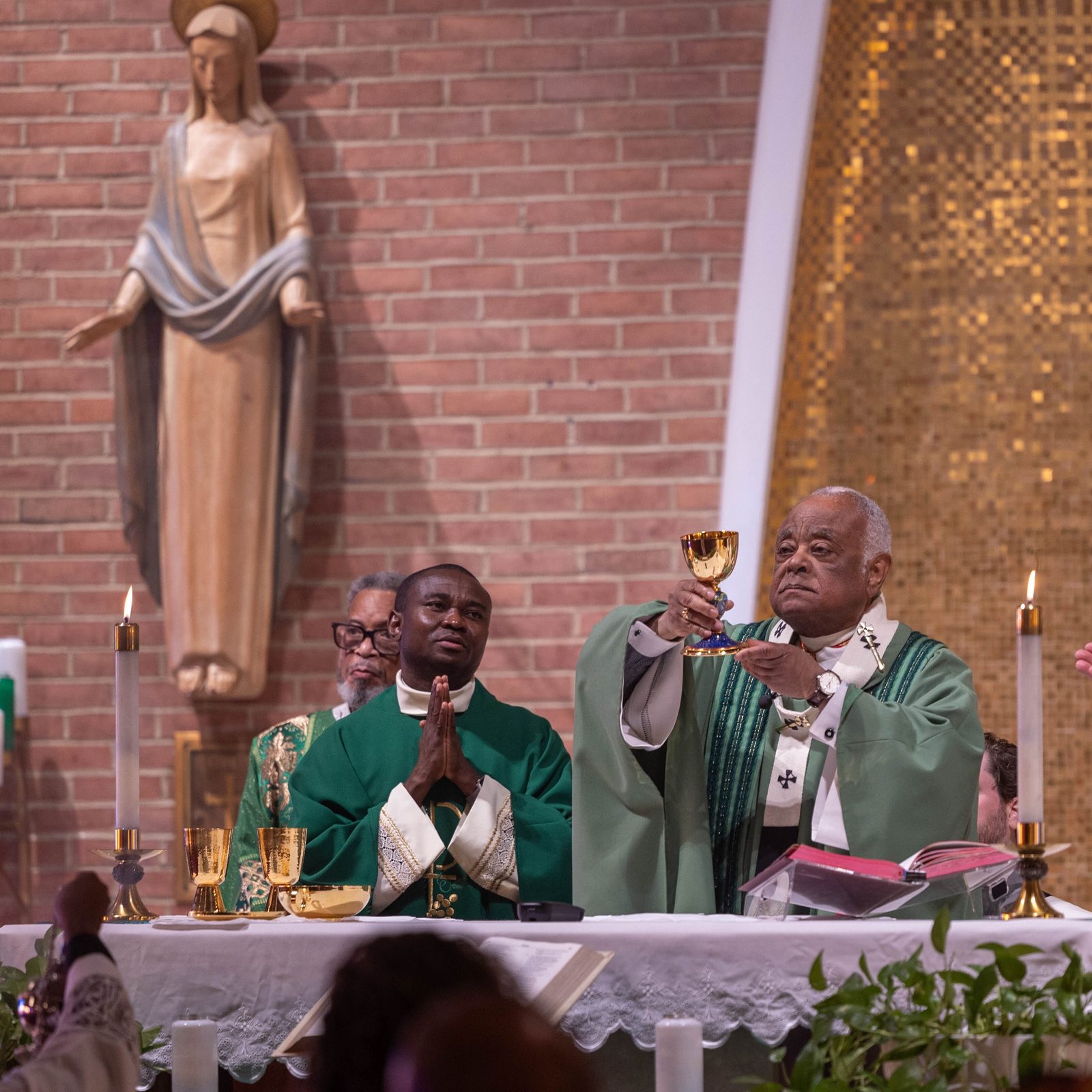 Cardinal Wilton Gregory celebrates a Mass on Sept. 15, 2024 at the Church of the Incarnation in Washington, D.C., marking the parish’s 100th anniversary. Standing at left at the altar is Josephite Father Stephen Sohe, the Church of the Incarnation’s pastor. (Catholic Standard photo by Mihoko Owada)