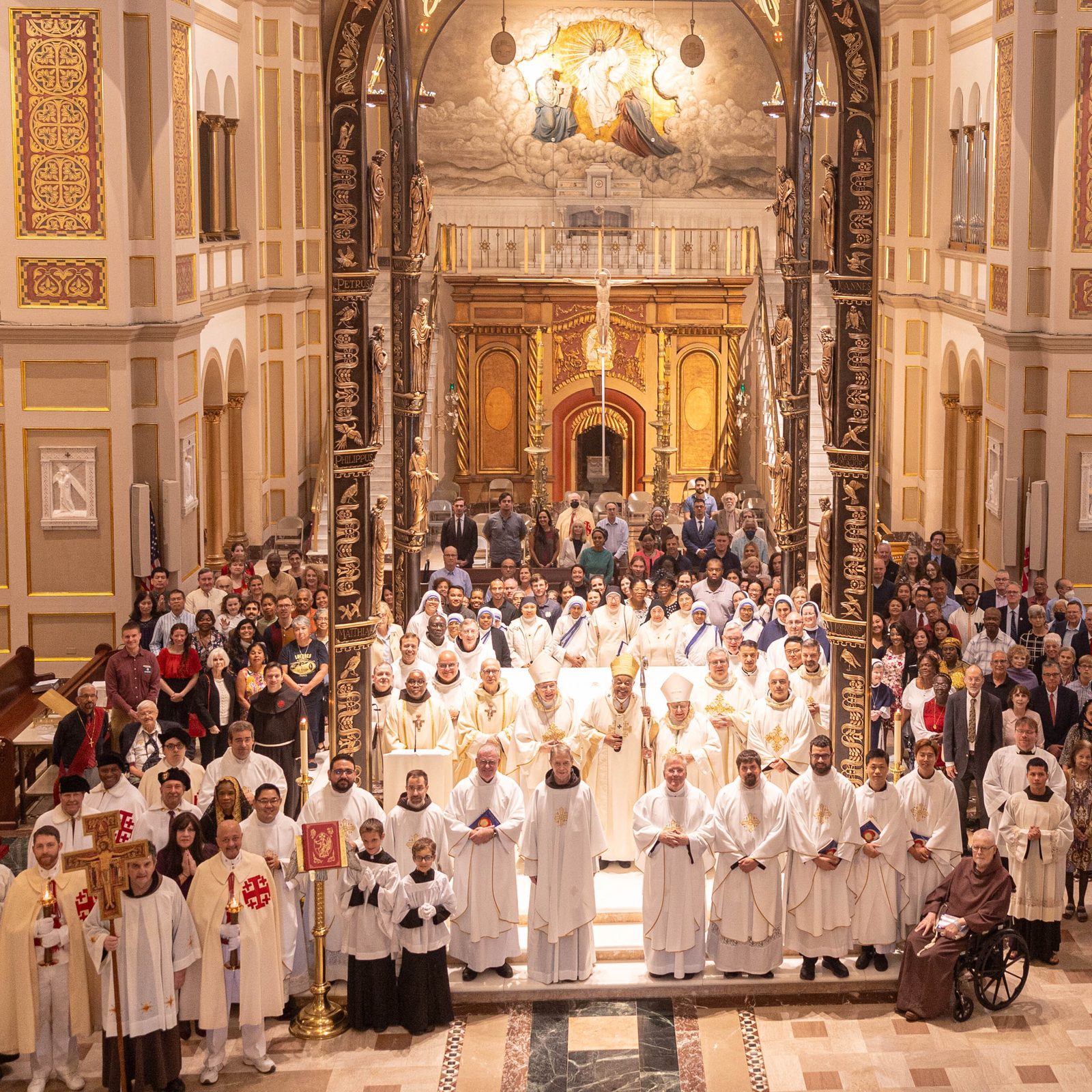 After the Sept. 22 Mass celebrating the 125th anniversary of the Franciscan Monastery of the Holy Land in Washington, D.C., all those who gathered for the Mass posed for a group photo. It was a recreation of the same photo that was taken at the monastery dedication Mass on Sept. 17, 1899. (Catholic Standard photo by Mihoko Owada)