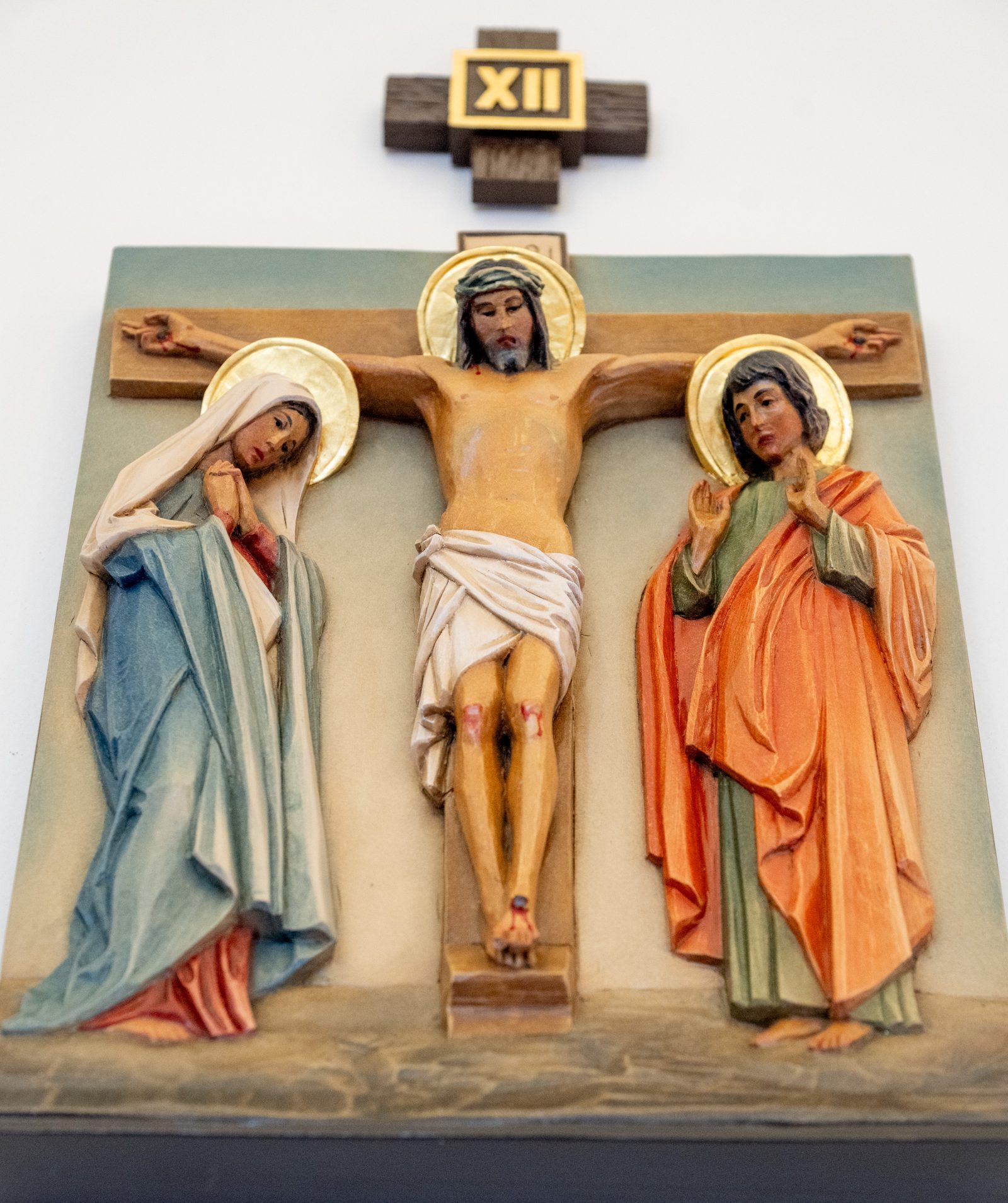 The new Stations of the Cross at St. John the Baptist Church in Silver Spring include, above, the 12th Station, Jesus Dies on the Cross, and below, the 13th Station, Jesus is Taken Down from the Cross. (Catholic Standard photos by Nicole Olea)