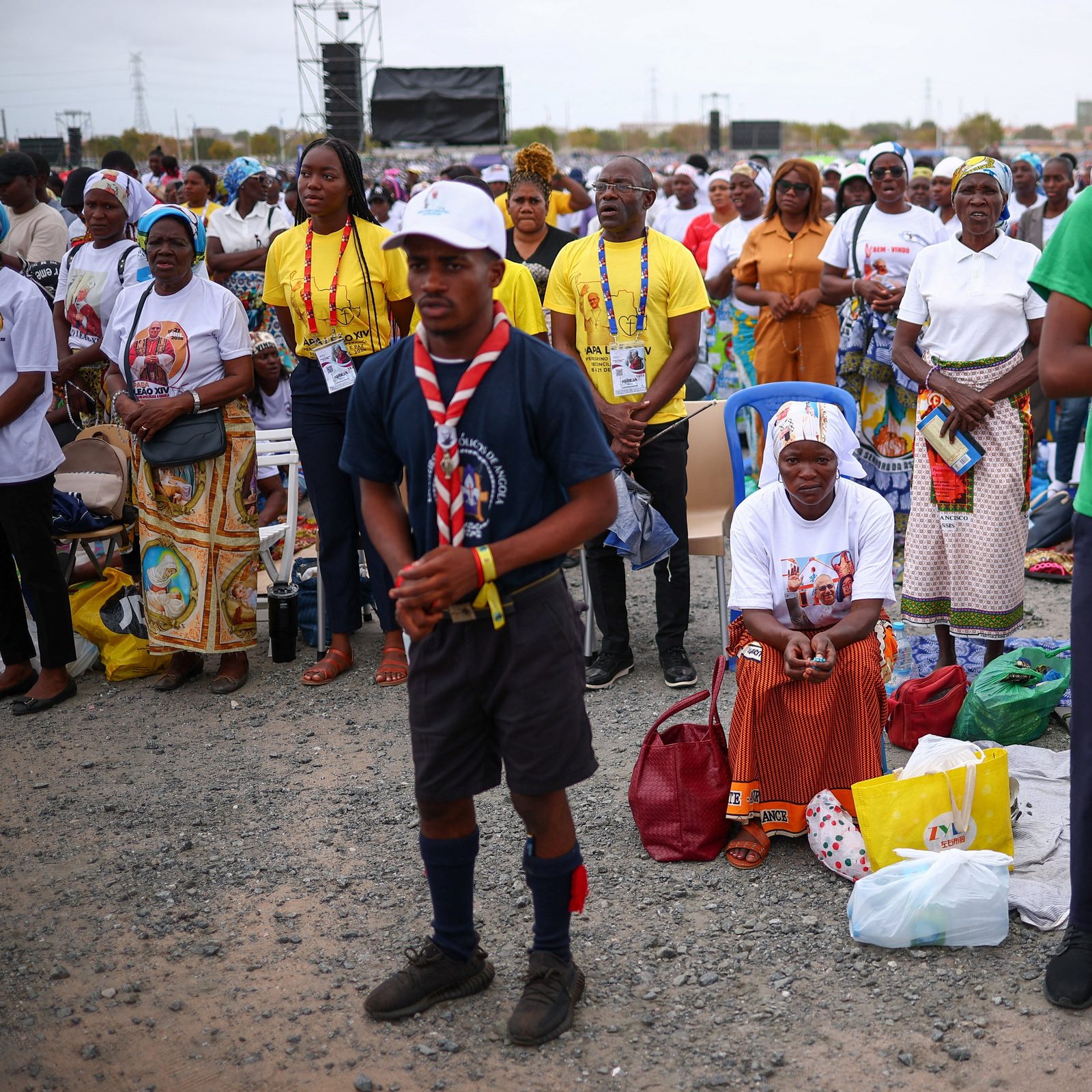 Faithful wait on the day Pope Leo XIV is to lead a Holy Mass, during his apostolic journey in Africa, in Kilamba, Luanda province, Angola, April 19, 2026. (OSV News/Guglielmo Mangiapane, Reuters)