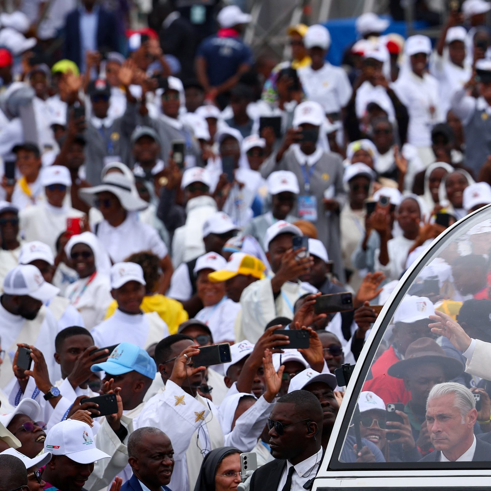 Pope Leo XIV waves to the faithful as he arrives to lead a Holy Mass during his apostolic journey in Africa, in Kilamba, Luanda province, Angola, April 19, 2026. (OSV News/Guglielmo Mangiapane, Reuters)