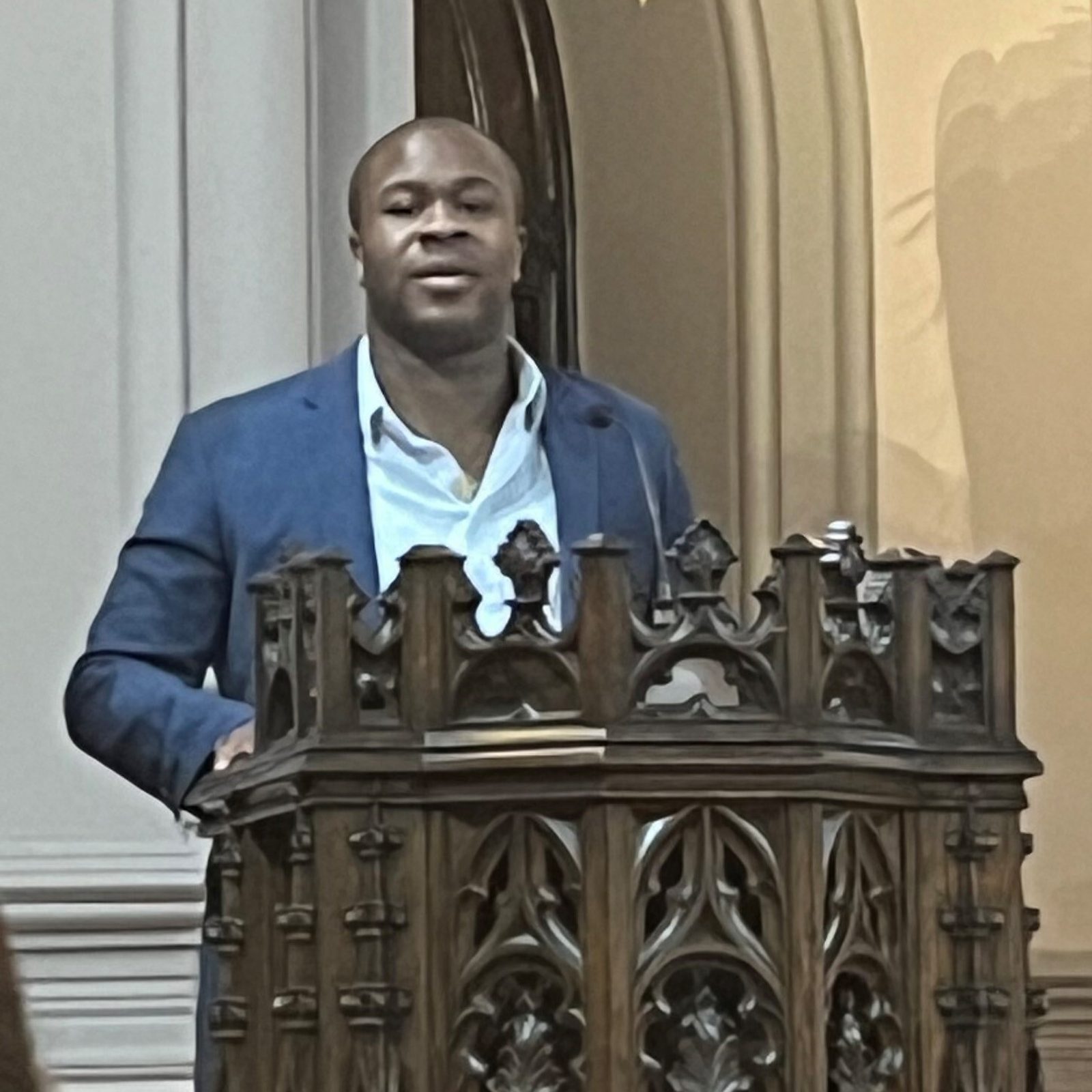 Anebi X. Adoga Jr., a Baltimore native and D.C. corporate lawyer who helped organize the “Come As You Are” Holy Week Prayer Service for Mental Health at St. Joseph Church on Capitol Hill speaks at the event on March 26, 2024. (Catholic Standard photo by Mark Zimmermann)