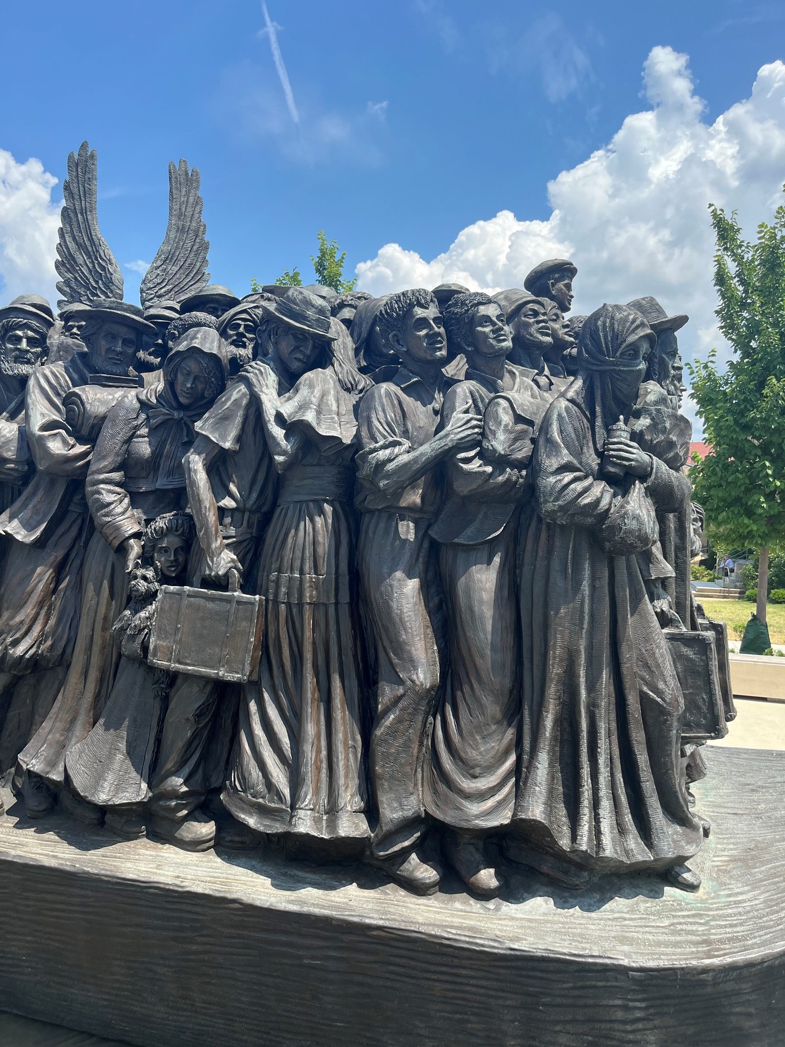 The “Angels Unawares” sculpture by artist Timothy Schmalz at the Welcome Plaza at The Catholic University of America in Washington, D.C., depicts refugees from around the world and from different historical eras, including Joseph, Mary and baby Jesus on their flight into Egypt. (Catholic Standard photos by Mark Zimmermann)
