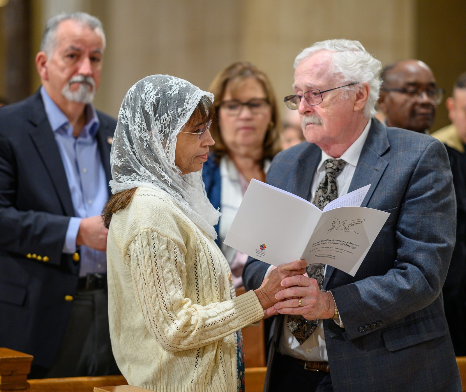 Couples renew their vows during the Annual Wedding Mass to celebrate the vocation of marriage at the Basilica of the National Shrine of the Immaculate Conception on Feb. 8, 2025. The Mass, celebrated by Washington Bishop Evelio Menjívar, was sponsored by the Office of Family Life of The Roman Catholic Archdiocese of Washington and honored the sacred bond of marriage as a lifelong journey of faith. (Catholic Standard photo by Nicole Olea)