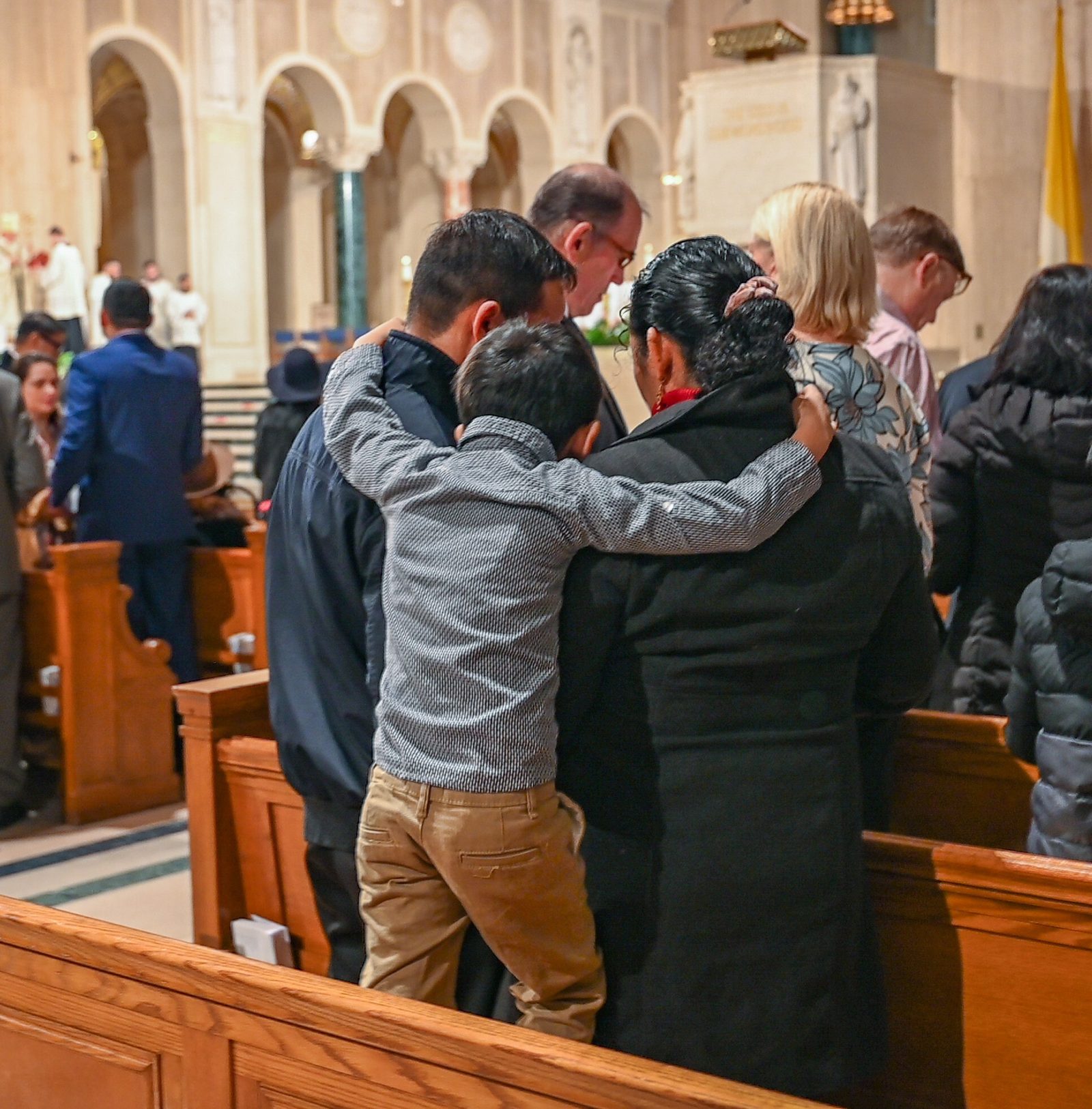Families pray together during the Annual Wedding Mass to celebrate the vocation of marriage at the Basilica of the National Shrine of the Immaculate Conception on Feb. 8, 2025. The Mass sponsored by the Office of Family Life of The Roman Catholic Archdiocese of Washington celebrated the sacrament of marriage and the role of faith in families. (Catholic Standard photo by Nicole Olea)