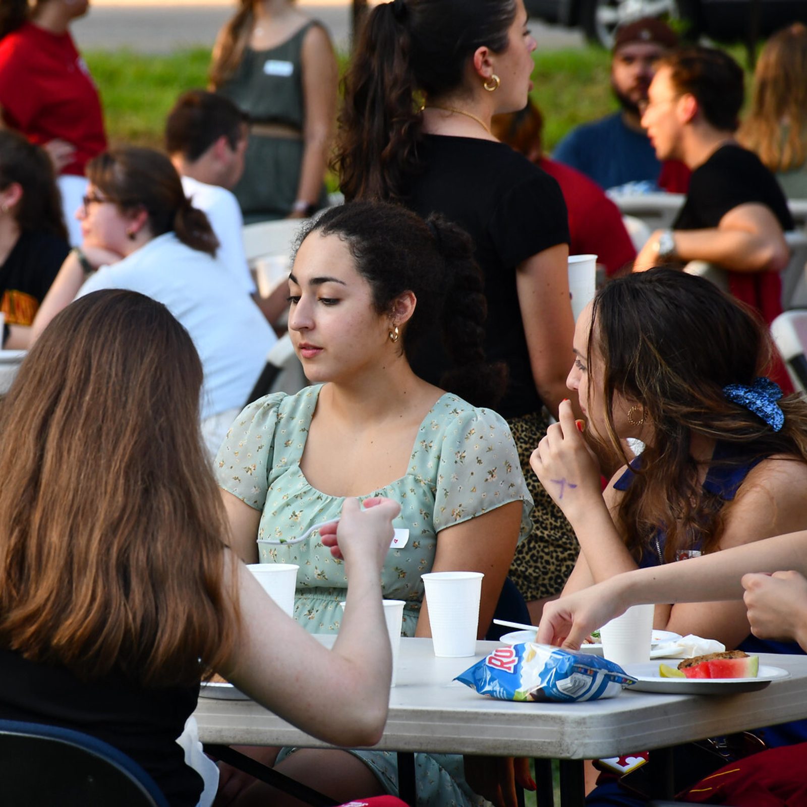 Students enjoy a meal together at an Aug. 28 barbecue hosted by the Catholic Student Center at the University of Maryland to welcome students back to campus. (Photo by Elizabeth Polo)