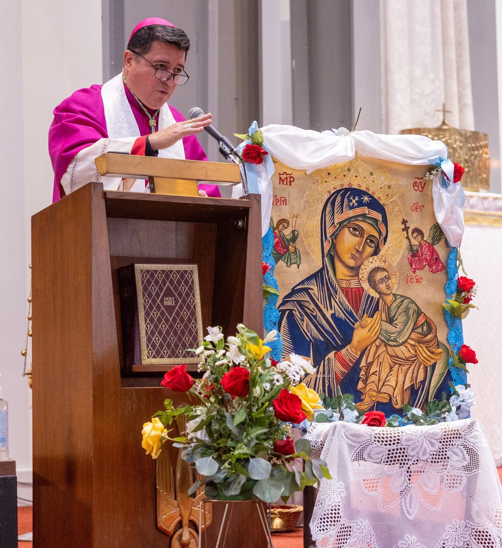 Washington Auxiliary Bishop Evelio Menjivar gives the homily during a Mass on Aug. 24, 2025 at Holy Spirit Church in Forestville, Maryland, for the Kidane-Mehret Parish for Ethiopian Catholics in The Roman Catholic Archdiocese of Washington. The Mass marked the feast day of the Assumption of the Blessed Virgin Mary and also marked Holy Spirit Church being the new home for that community. (Catholic Standard photo by Mihoko Owada)