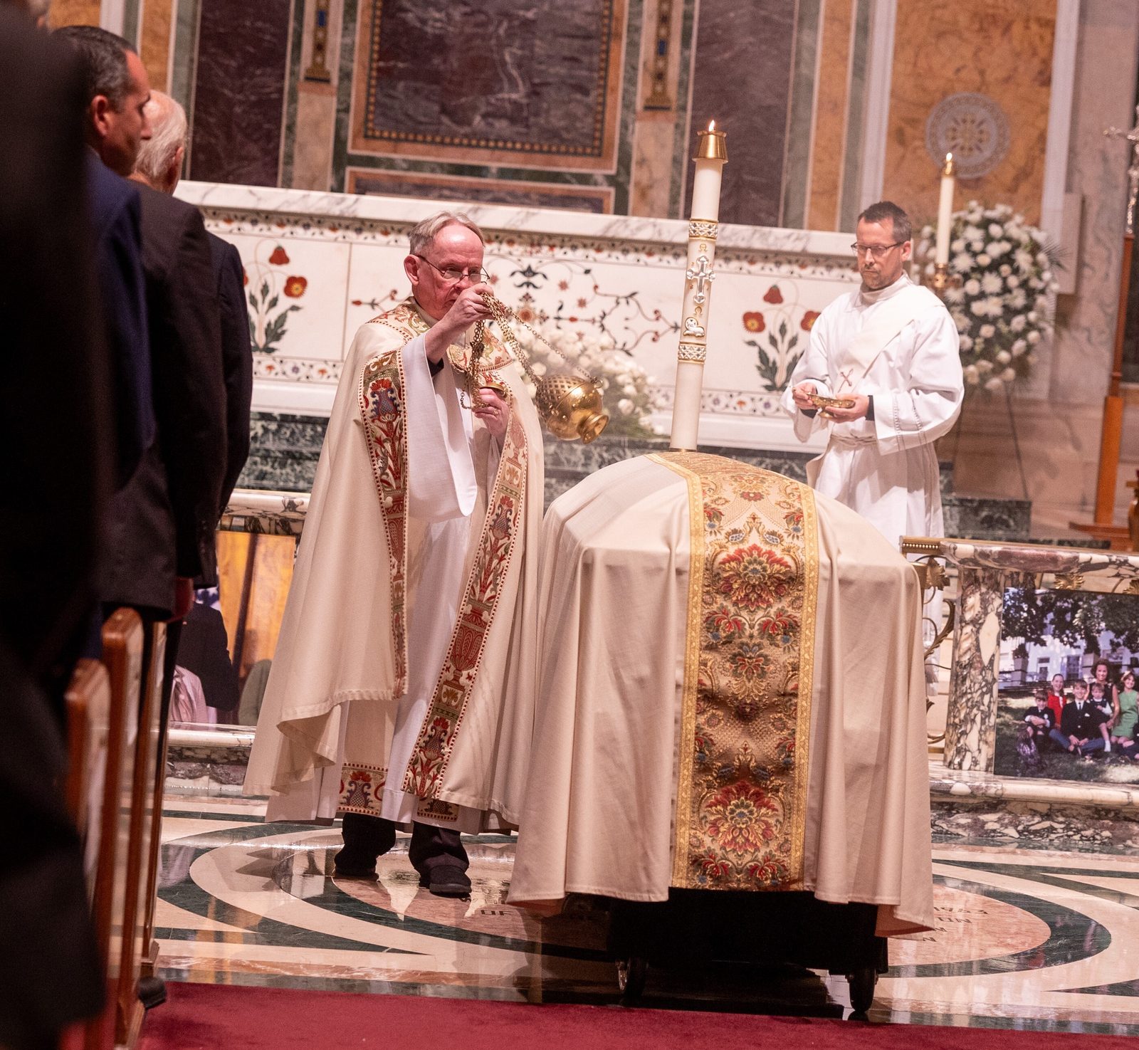 Jesuit Father Don MacMillan incenses the casket of Ethel Kennedy during the commendation at the end of an Oct. 16, 2024 memorial service for her at the Cathedral of St. Matthew the Apostle in Washington, D.C. (Catholic Standard photo by Mihoko Owada)