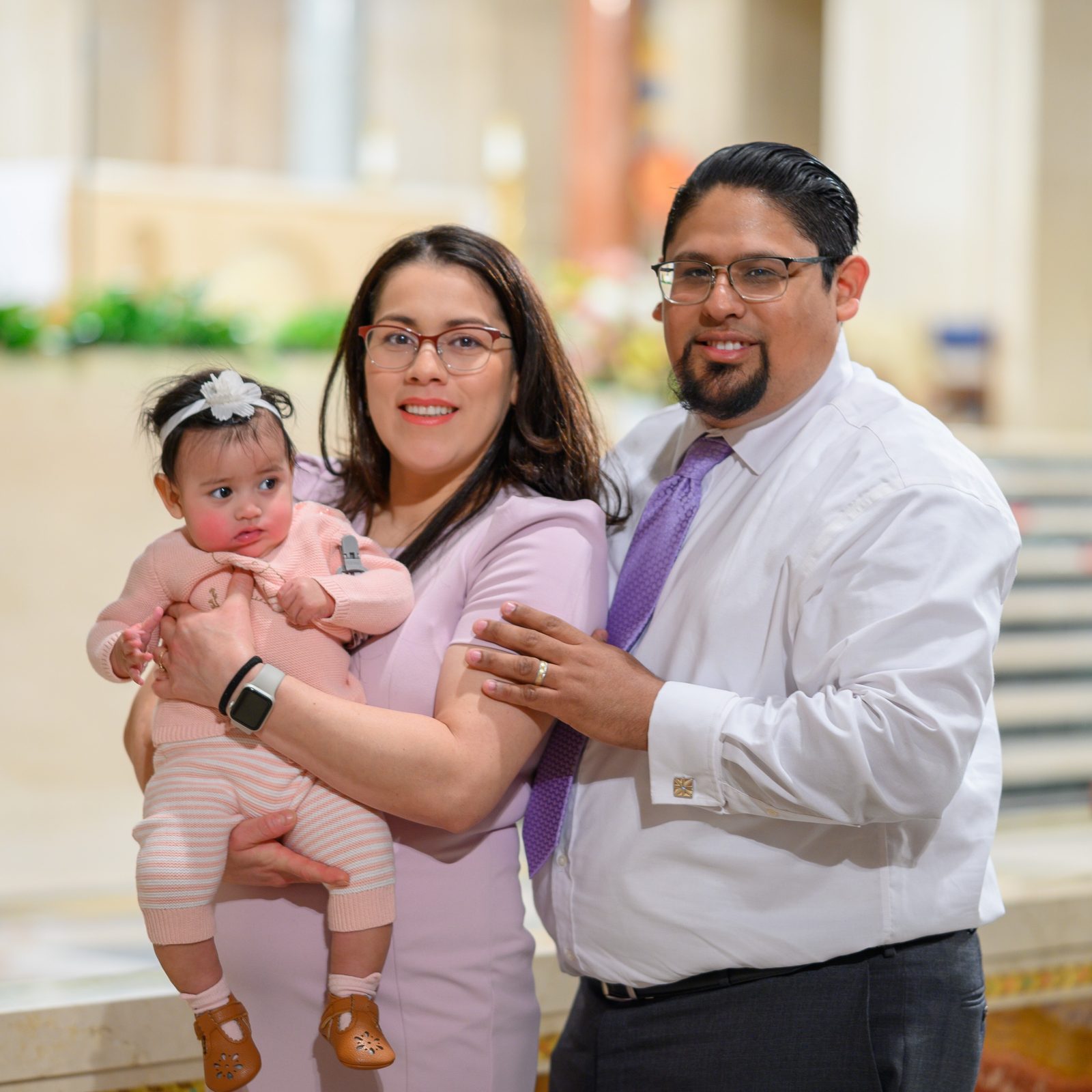 A family poses for a photo after participating in the Annual Wedding Mass at the National Shrine on Feb. 8, 2025. (Catholic Standard photos by Nicole Olea)