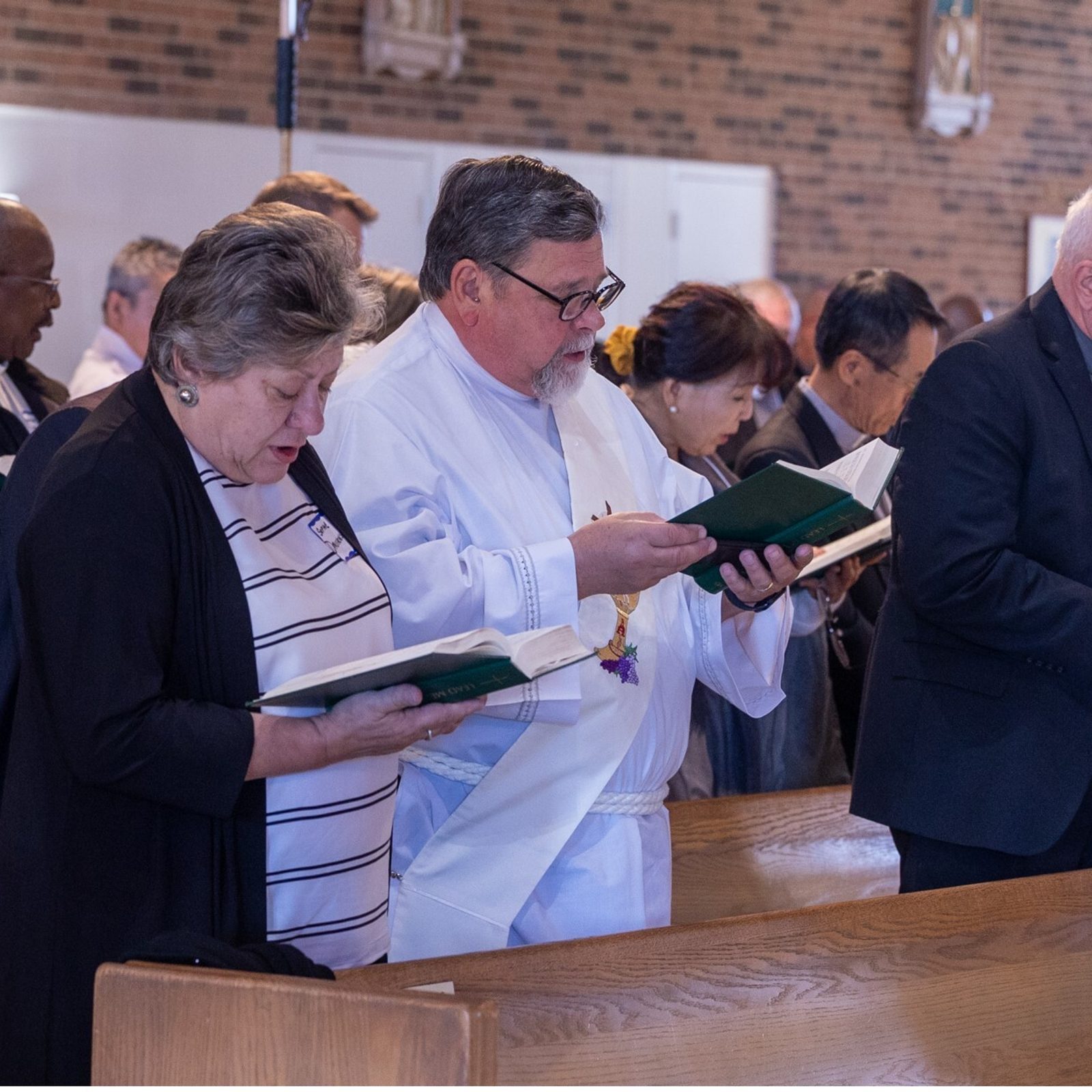 People pray during a Mass for The Roman Catholic Archdiocese of Washington’s Annual Convocation for Permanent Deacons and Wives held at St. Joseph Church in Largo, Maryland, on Nov. 9, 2024. (Catholic Standard photo by Mihoko Owada)