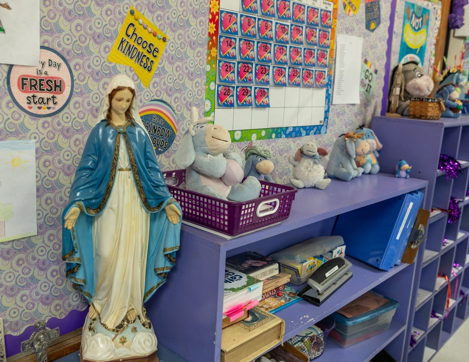 The classroom of Margo VanDenBossche, a third grade teacher at Saint Peter’s School in Waldorf, Maryland, who is a 2024 Golden Apple Award winning teacher, contains dozens of stuffed animals and other images of her favorite cartoon character, Eeyore from the Winnie the Pooh stories. (Catholic Standard photo by Mihoko Owada)