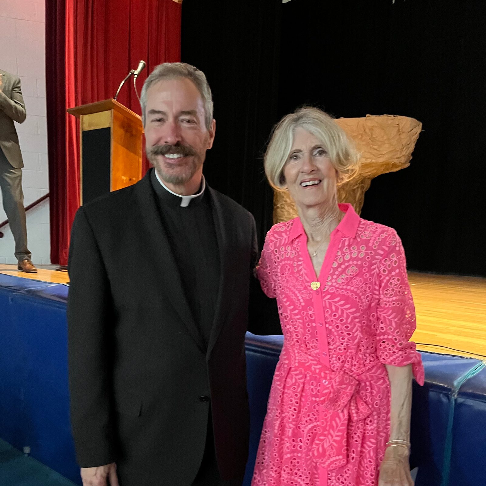 Betsy Hamilton – who served as the principal of St. Jane de Chantal School in Bethesda, Maryland for 37 years before retiring at the end of June – poses with Father Samuel Giese, De Chantal’s pastor, at a May 31 celebration at the parish honoring her. (Catholic Standard photo by Mark Zimmermann)