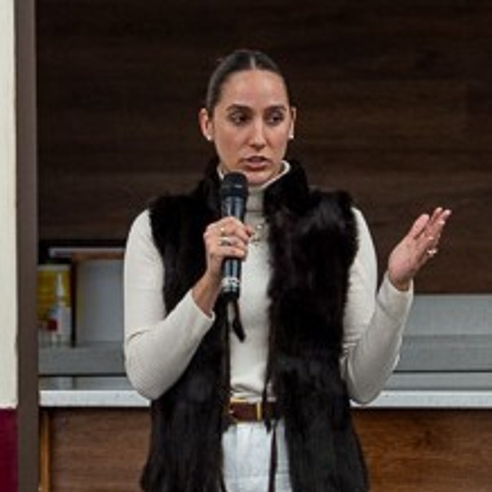 Felicitas Brugo Onetti, anti-trafficking education and outreach coordinator for Migration and Refugee Services at the U.S. Conference of Catholic Bishops, speaks during a presentation following a Feb. 7 vigil Mass at St. Mary’s Catholic Church in Landover Hills that marked the World Day of Prayer and Awareness Against Human Trafficking. (Catholic Standard photo by Nicole Olea)