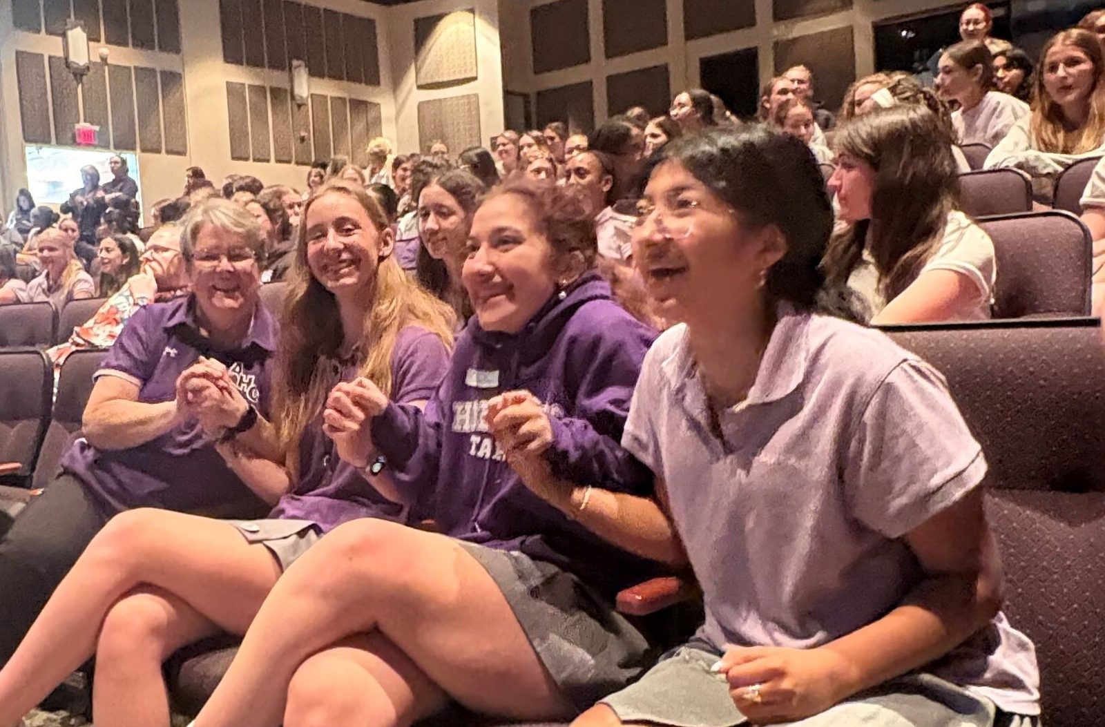 Students and teachers gathered in the theater at The Academy of the Holy Cross in Kensington, Maryland, excitedly await and then watch the appearance of the new pope, Leo XIV, on May 8, 2025. (Photos by Maika Walker/The Academy of the Holy Cross)