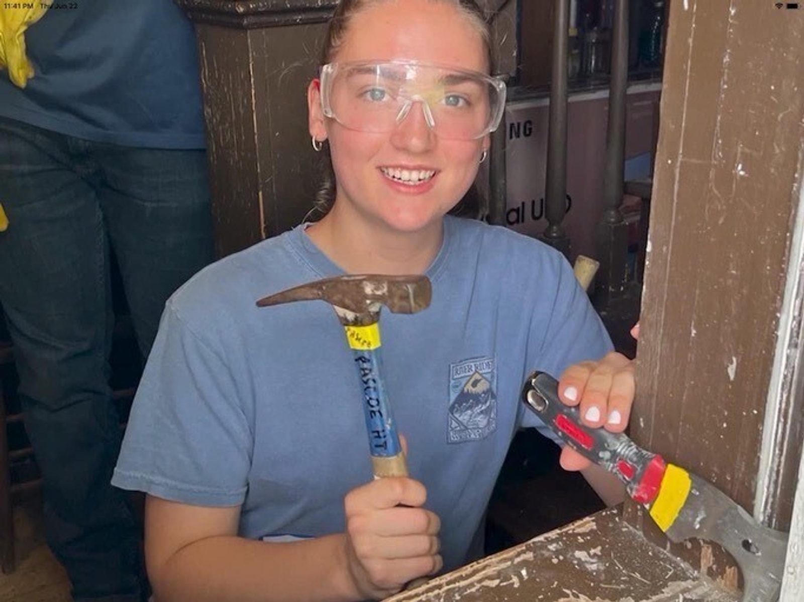 As part of a summertime service project for teens with the Diocese of Arlington’s WorkCamp, Hope Dickson is shown replacing a window in a home. The senior at Georgetown Visitation Preparatory School in Washington, D.C. was recently named as a recipient of the 2025 Youth Virtues, Valor and Vision Award from the National Catholic Educational Association. (Courtesy photo)