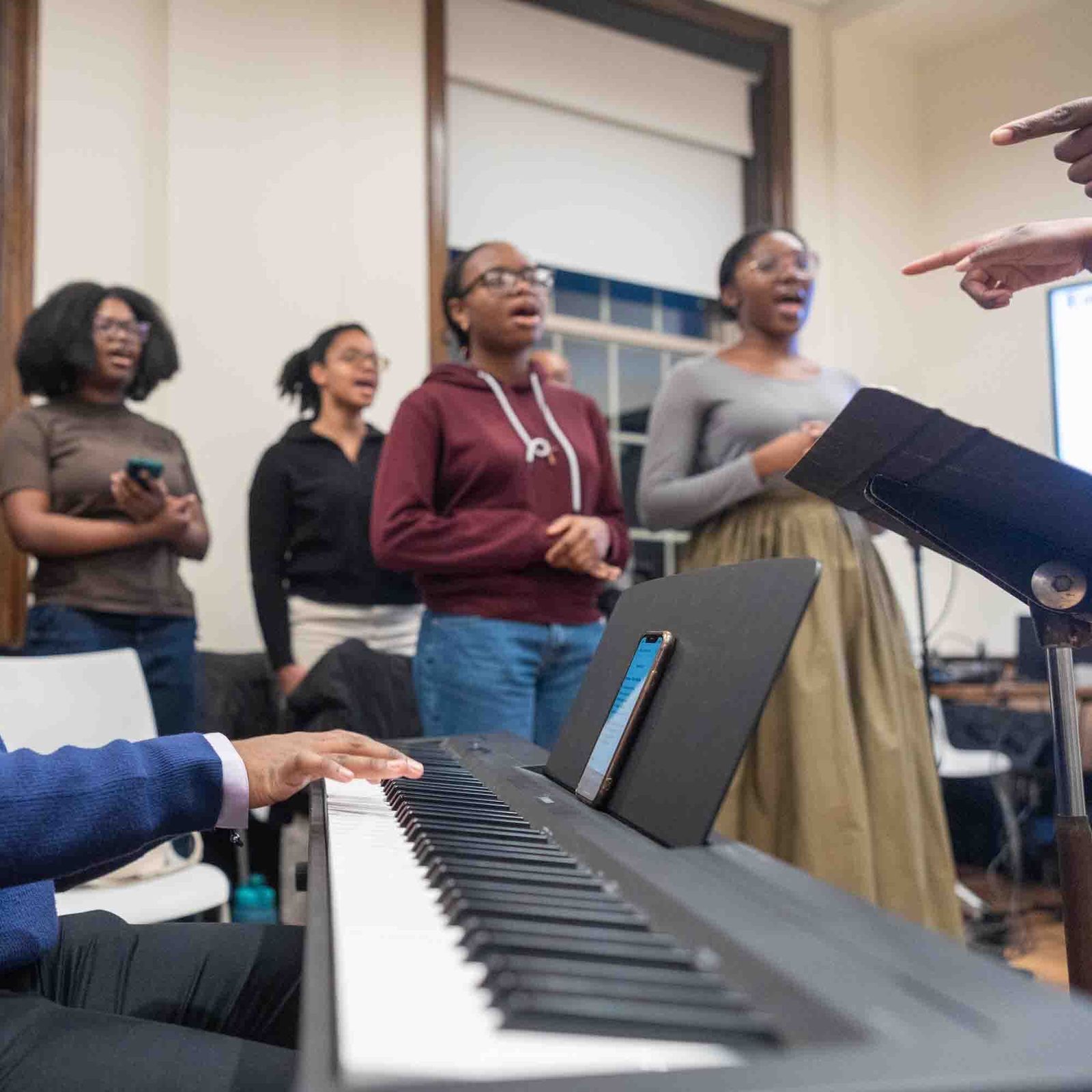 Members of the choir sing during a Feb. 1 Mass celebrated at Howard University by Washington Cardinal Robert W. McElroy for the HU Bison Catholic community there. (Catholic Standard photo by Mihoko Owada)