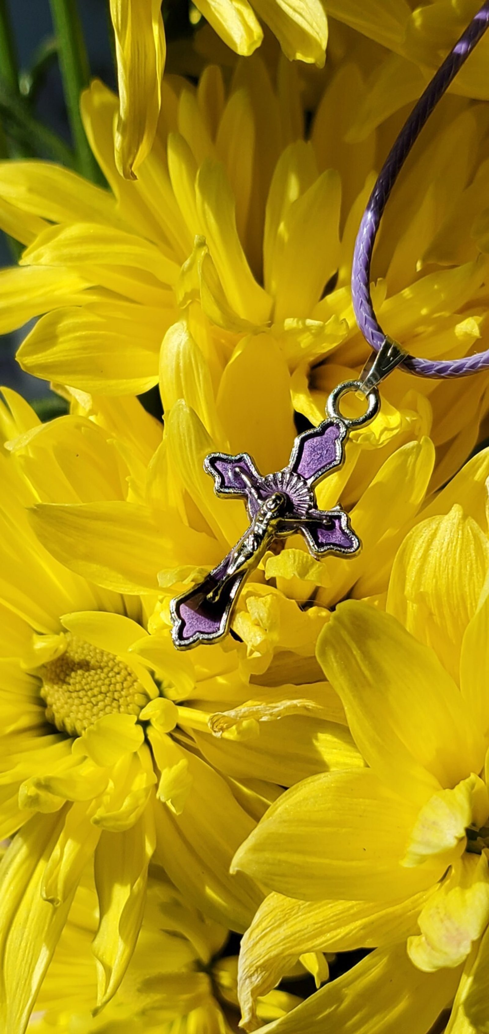 This purple cross necklace helped inspire Rachel Lincoln to become Catholic. At the March 30, 2024 Easter Vigil at the Cathedral of St. Matthew the Apostle in Washington, she received the sacraments of Baptism, Confirmation and Eucharist. (Photo by Rachel Lincoln)