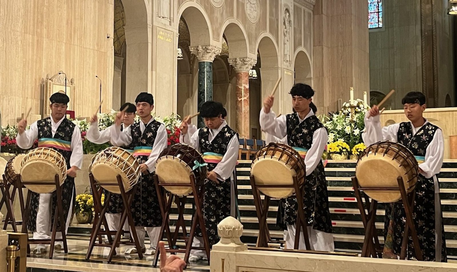 Drummers from the Peace Mission Korean Dance Group of St. Andrew Kim Korean Catholic Parish in Olney, Maryland, play traditional drums at the beginning of the 22nd annual Asian and Pacific Island Catholics Marian Pilgrimage to the Basilica of the National Shrine of the Immaculate Conception on May 3, 2025. (Catholic Standard photo by Mark Zimmermann)