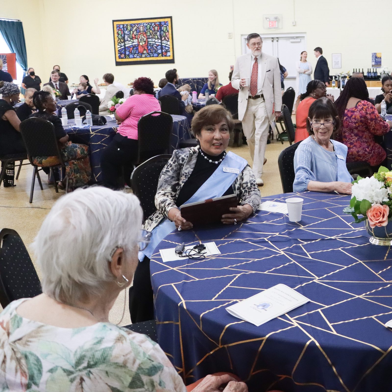 The guests at a July 28 reception marking the 175th anniversary of St. Ignatius Church in Oxon Hill, Maryland, included members of the Ladies of Charity. (Catholic Standard photo by Javier Diaz)