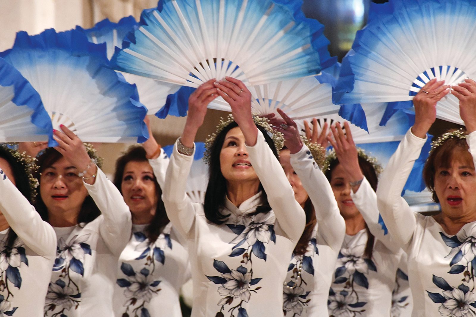 Vietnamese dancers from the Our Lady of La Vang Mission in Chantilly, Virginia, participate in the call to prayer featuring sacred songs and movements during the 22nd annual Asian and Pacific Island Catholics Marian Pilgrimage to the Basilica of the National Shrine of the Immaculate Conception on May 3, 2025. The dancers are part of the Daughters of Mary organization. (Catholic Standard photo by Patrick Ryan)