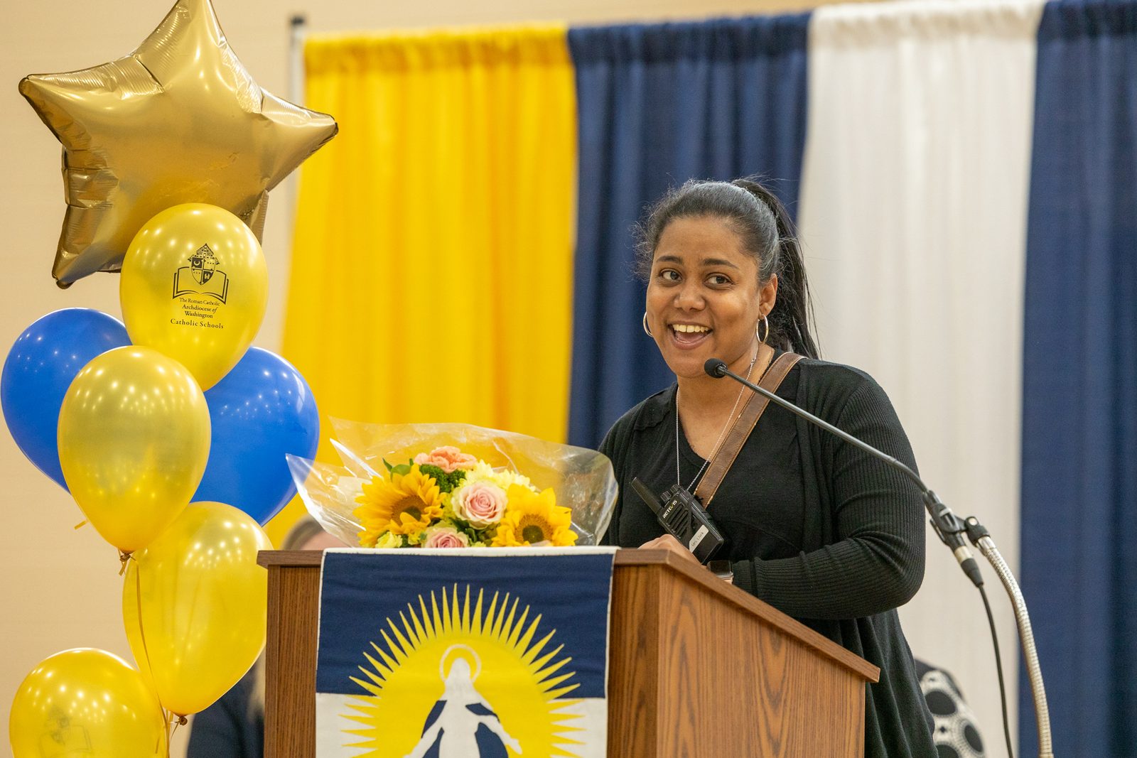 Renee Clark, the resource teacher at St. Mary of the Assumption Catholic School in Upper Marlboro, Maryland, speaks during a surprise assembly on April 15, 2024, after learning she is one of 10 Golden Apple Award-winning Catholic school teachers in The Roman Catholic Archdiocese of Washington for this school year. (Catholic Standard photo by Mihoko Owada)