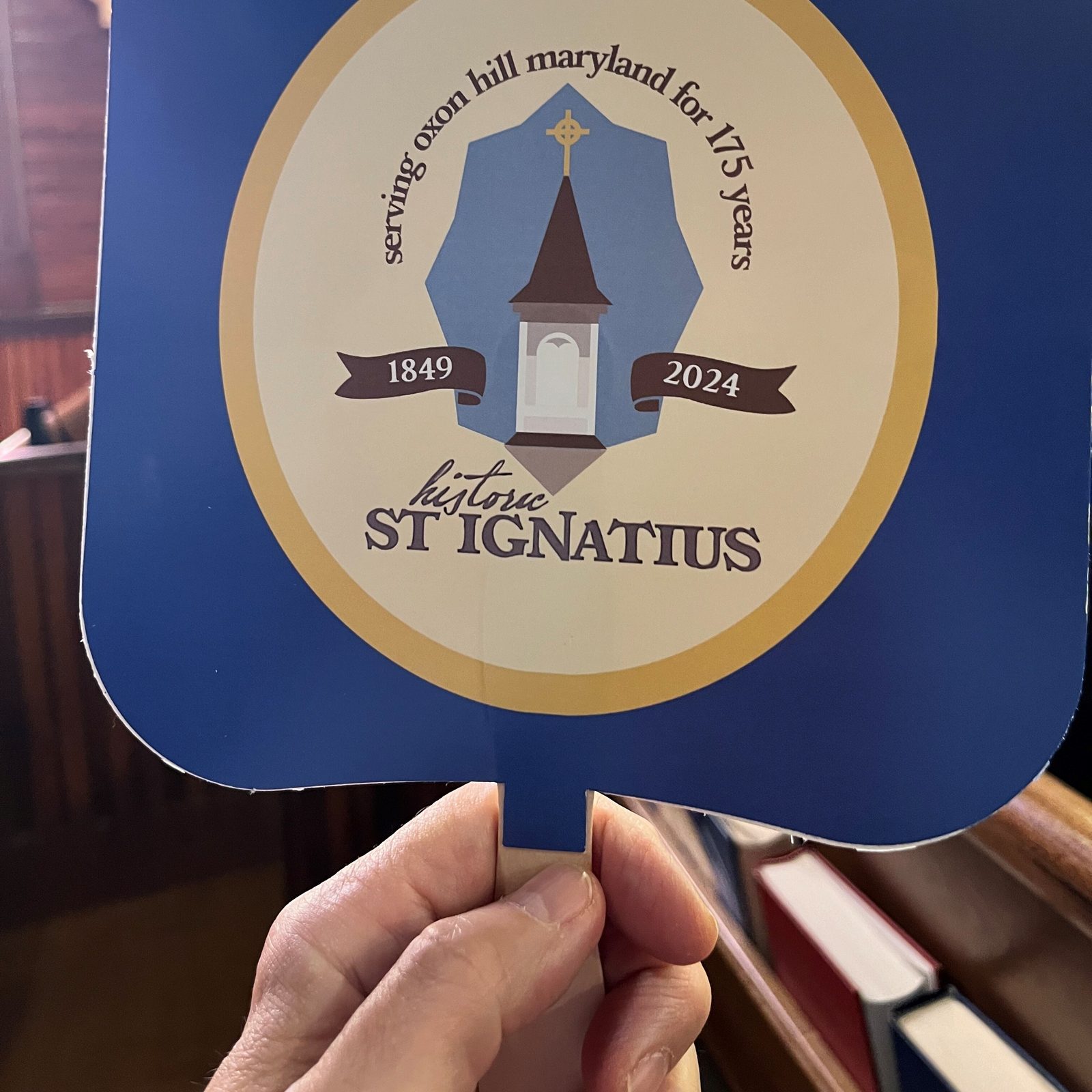 Commemorative fans were produced to mark the 175th anniversary of St. Ignatius Church in Oxon Hill, Maryland. (Catholic Standard photo by Mark Zimmermann)